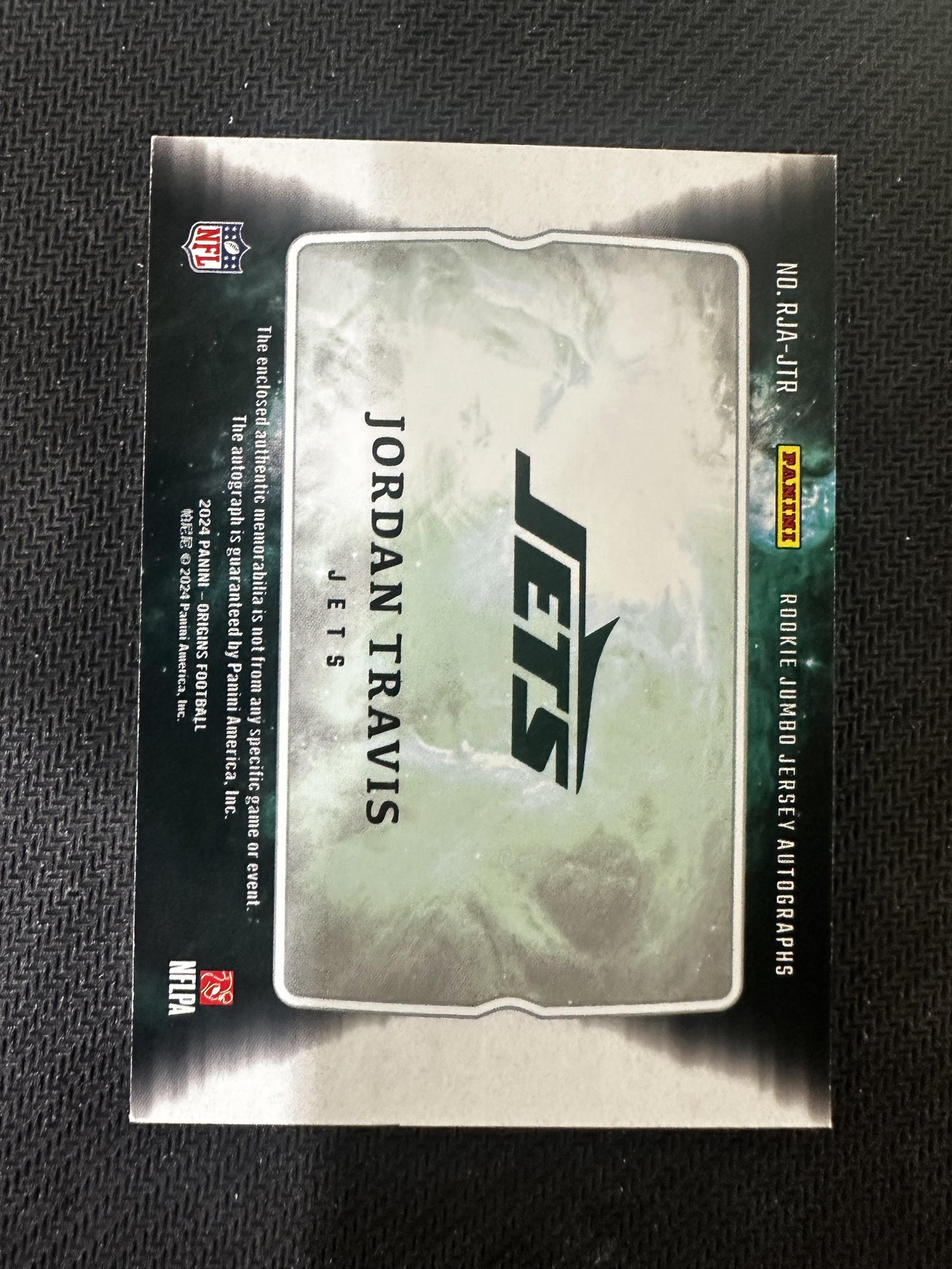 #RJA-JTR Jordan Travis 2024 Panini Origins /49 Jets Jumbo Jersey Auto Blue