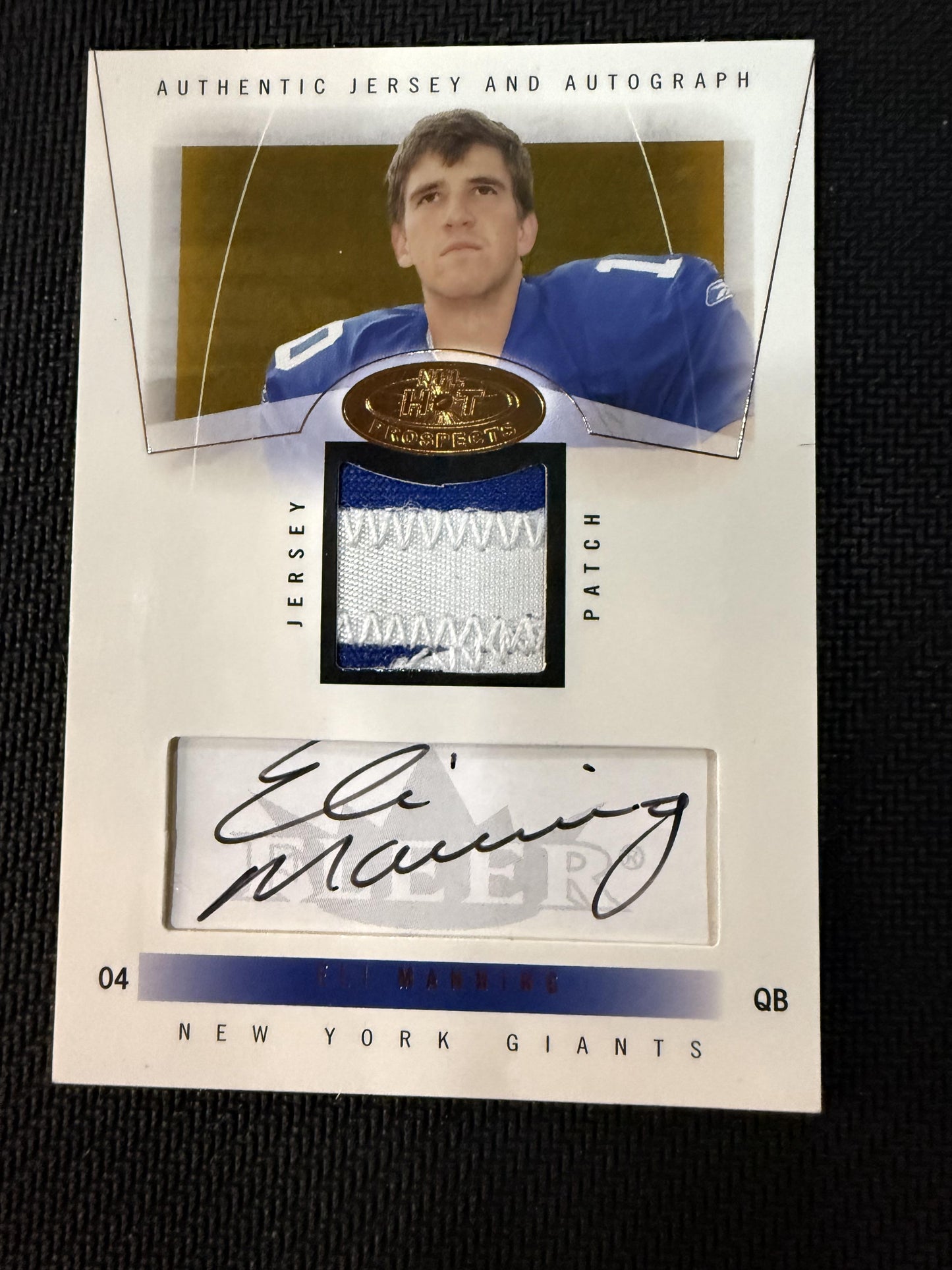 #83 Eli Manning 2004 Fleer Hot Prospects AU,SN,MEM,RC Rookie Auto #/350 Giants