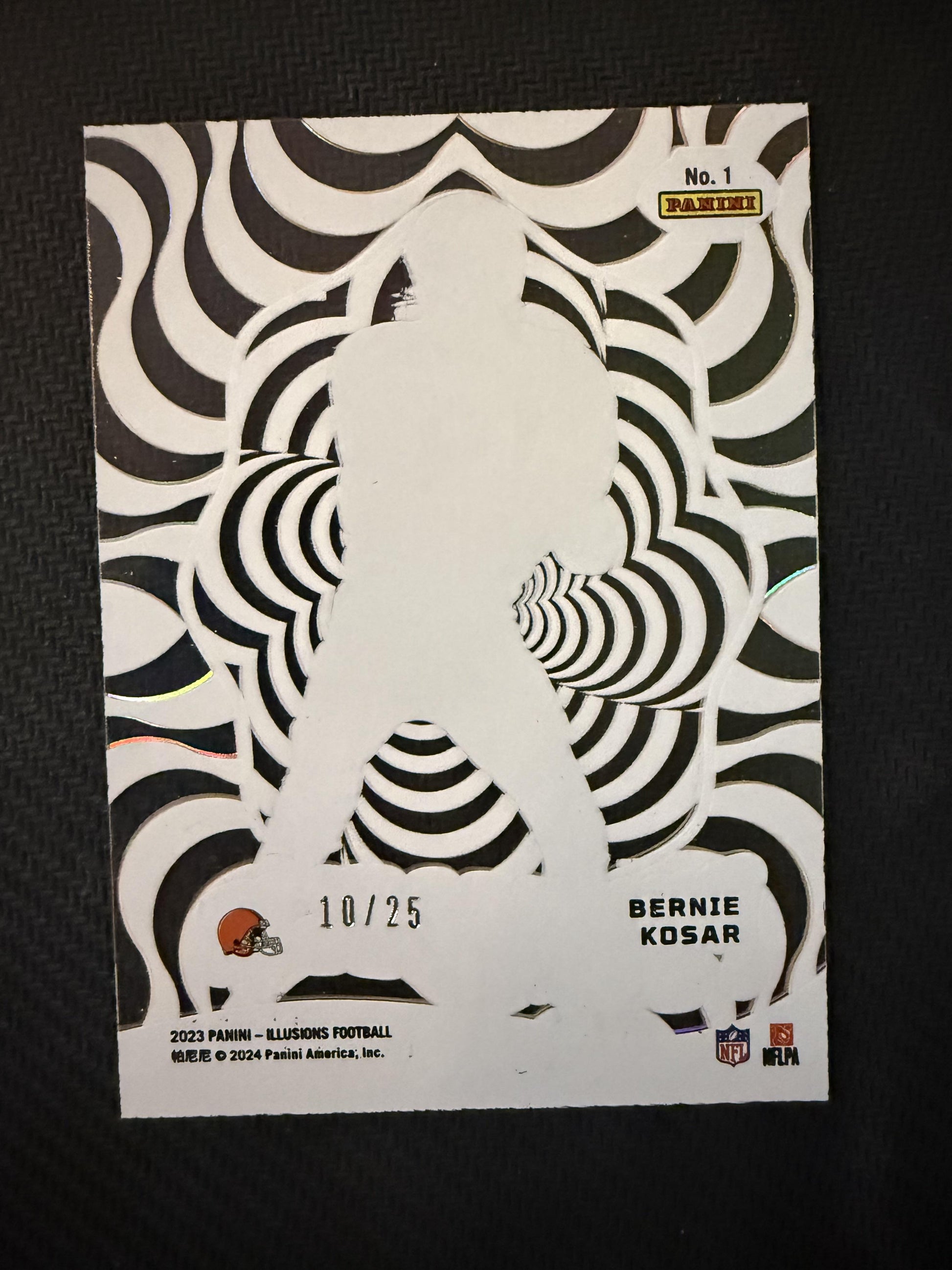 #1 Bernie Kosar 2023 Panini Illusions SN #/25 Cleveland Browns Funkadelic Gold