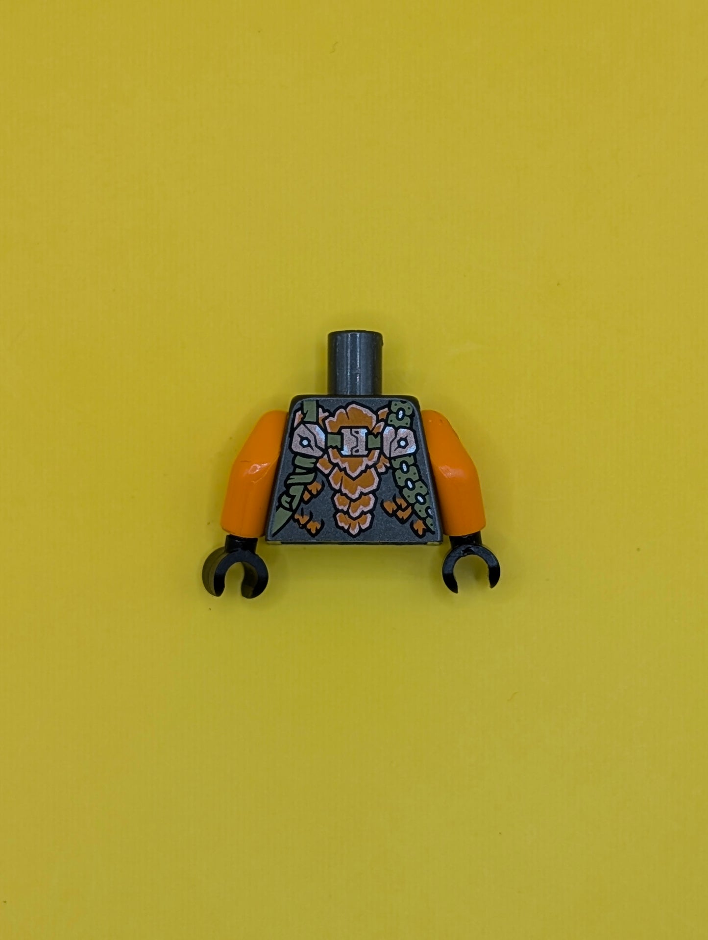 Torso Orange Breastplate, Olive Green Straps, Silver Snake Head and Tooth, Dark Turquoise Spots Pattern / Orange Arms / Dark Bluish Gray Hands 973pb4542c01 Lego