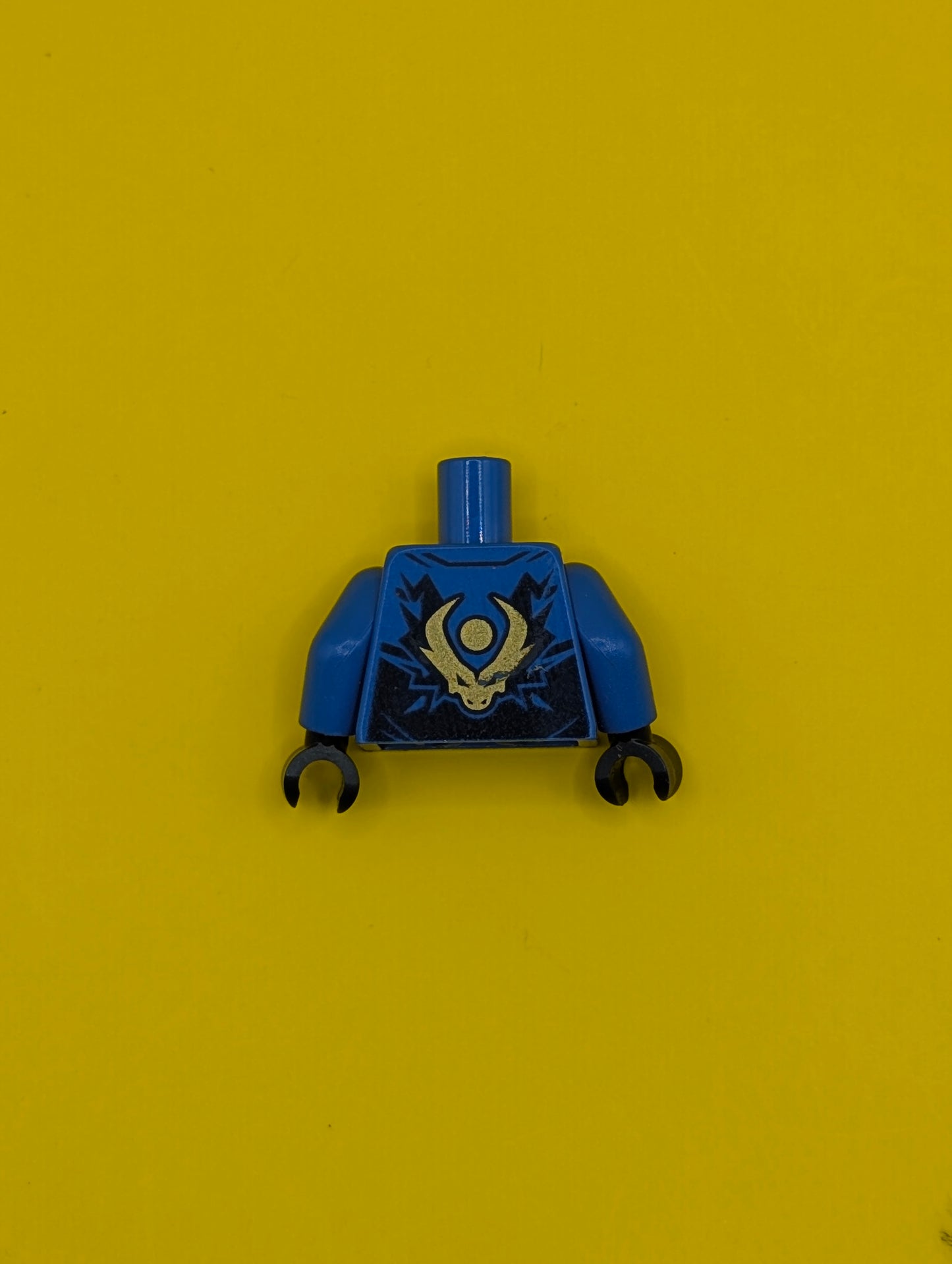 Torso Ninja Robe with Dark Blue Trim and Gold Buckles over Bright Light Yellow Sash, Ninjago Logogram Letter J in Circle, Dragon Head and Orb on Back Pattern / Blue Arms / Dark Blue Hands 973pb5251c01 Lego