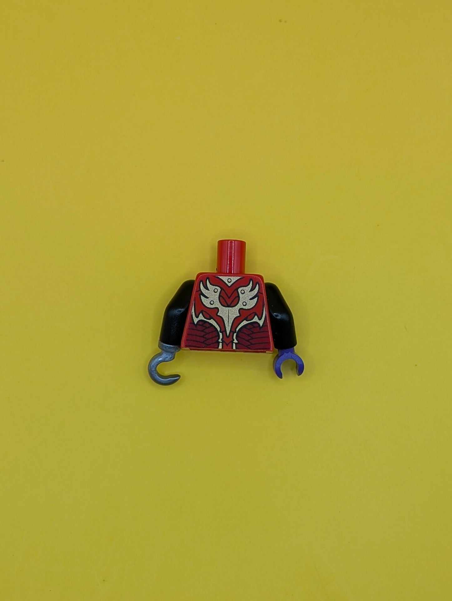 Torso Vest with Dark Red and Gold Armor with Scales and Orange Round Jewel (Fire Chi) Pattern / Black Arms / Dark Purple Hand Right / Flat Silver Hook Left 973pb1715c06 Lego