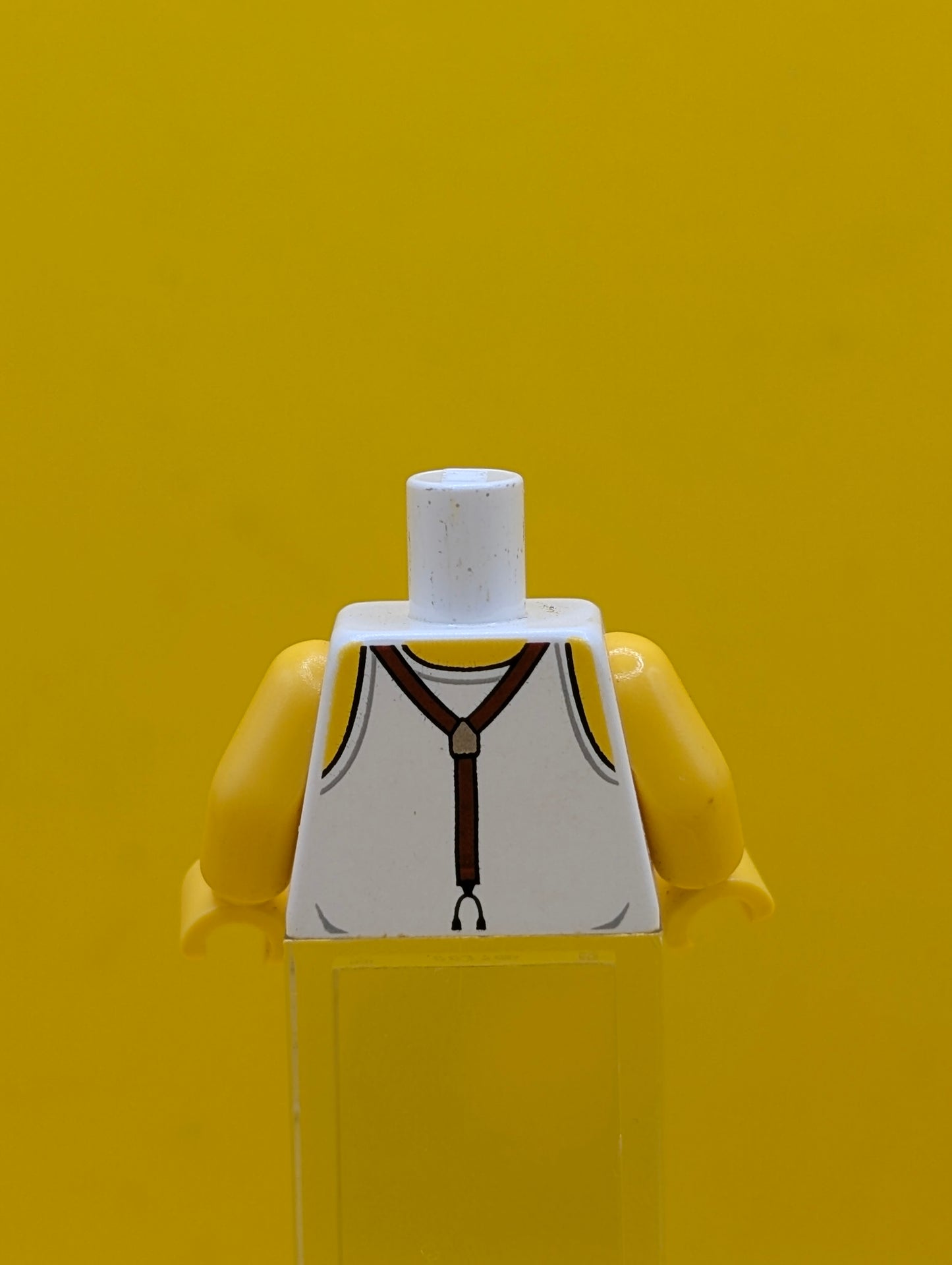 973pb0784c01 Torso Pharaoh's Quest Tank Top with Suspenders, Mud and Hairy Chest Pattern / Yellow Arms / Yellow Hands Lego
