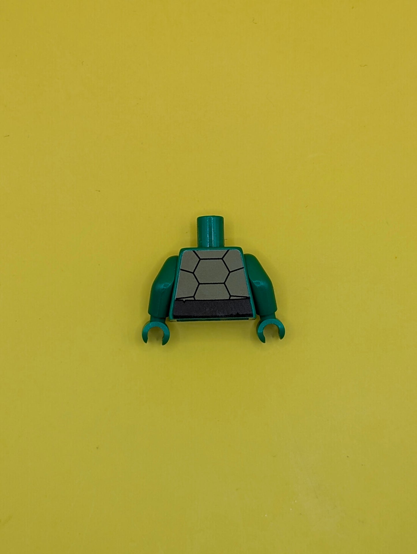 973pb1341c01 Torso Tan and Dark Tan Turtle Shell, Dark Brown Belt and Straps Pattern / Green Arms / Green Hands Lego Part
