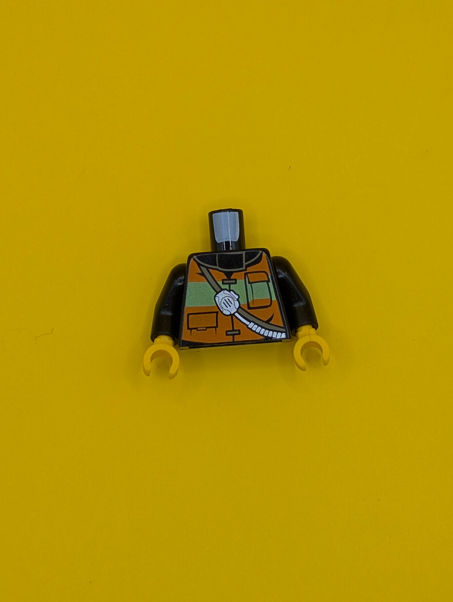Torso Fire Reflective Stripe Vest with Pockets and Shoulder Strap with Radio and Fire Badge on Back Pattern / Black Arms / Yellow Hands 973pb1303c01 Lego