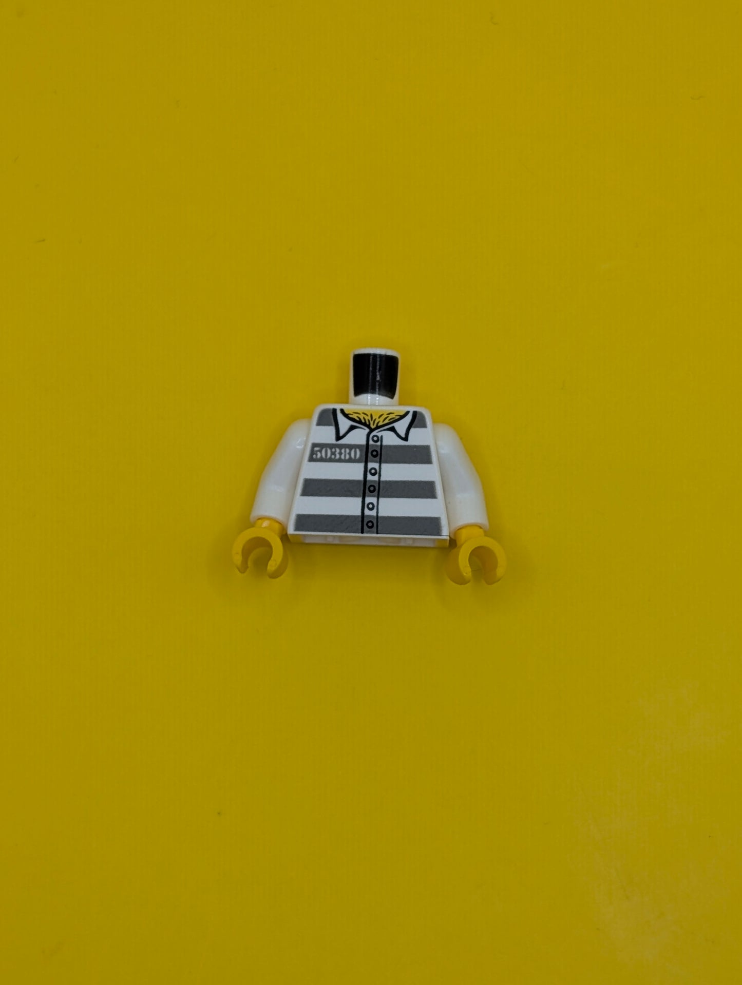 973pb3375c01 Torso Prison Uniform Shirt with '50380', 5 Buttons, and Dark Bluish Gray Stripes, Hairy Chest, Yellow Neck Pattern / White Arms / Yellow Hands Lego Part