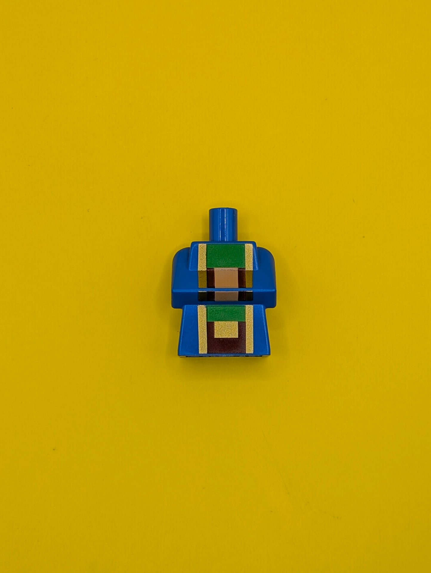 Torso, Modified Long with Folded Arms with Pixelated Dark Red, Gold, Green, and Light Nougat Minecraft Wandering Trader Pattern 25767pb006 Lego