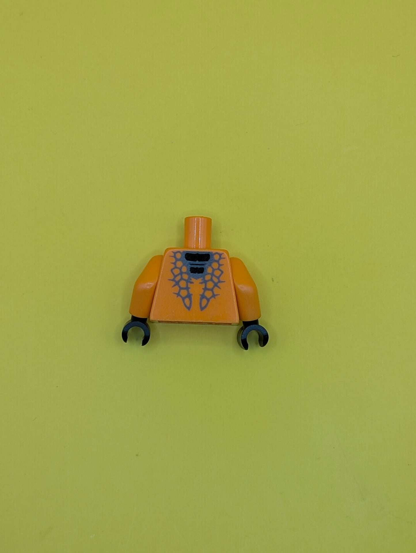 973pb1196c01 Torso Ninjago Snake with Black Scales Pattern (Snike) / Orange Arms / Black Hands Lego Part
