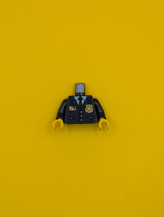973pb3772c01 Torso Police Suit with Tie and Pockets, Gold Star Badge Logo and Buttons, Light Blue Undershirt Pattern / Dark Blue Arms / Yellow Hands Lego Part