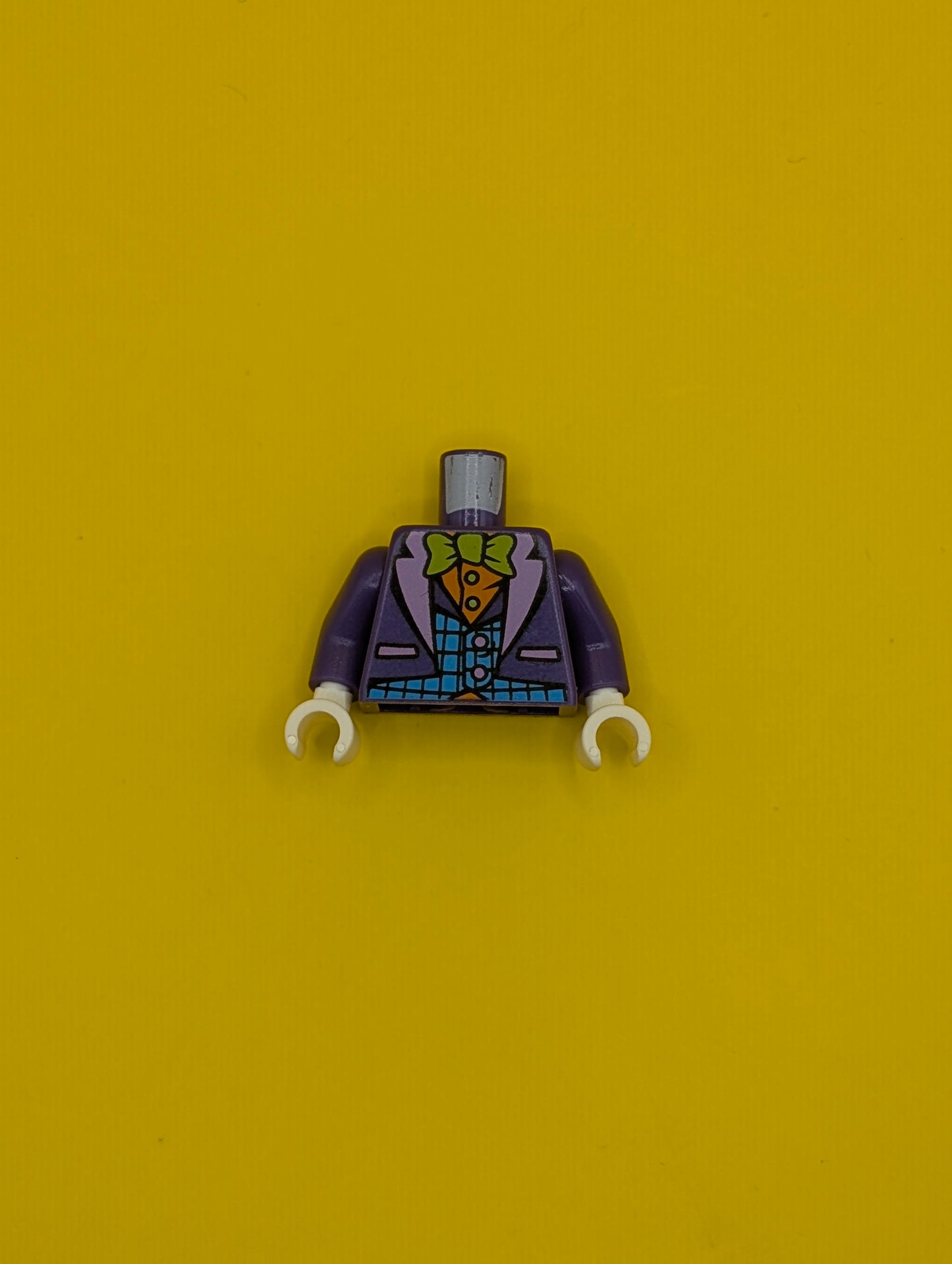 973pb1648c01 Torso Batman Suit with Medium Azure Vest, Orange Shirt, and Lime Bow Tie Pattern / Dark Purple Arms / White Hands Lego Part