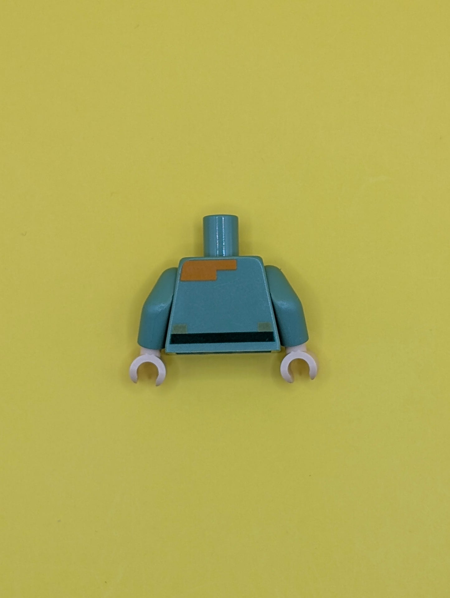 Torso Pixelated Shirt with Olive Green Collar and Dark Green Belt, Light Nougat Neck, Orange Hair Pattern / Sand Green Arms / Light Nougat Hands 973pb2186c01 Lego