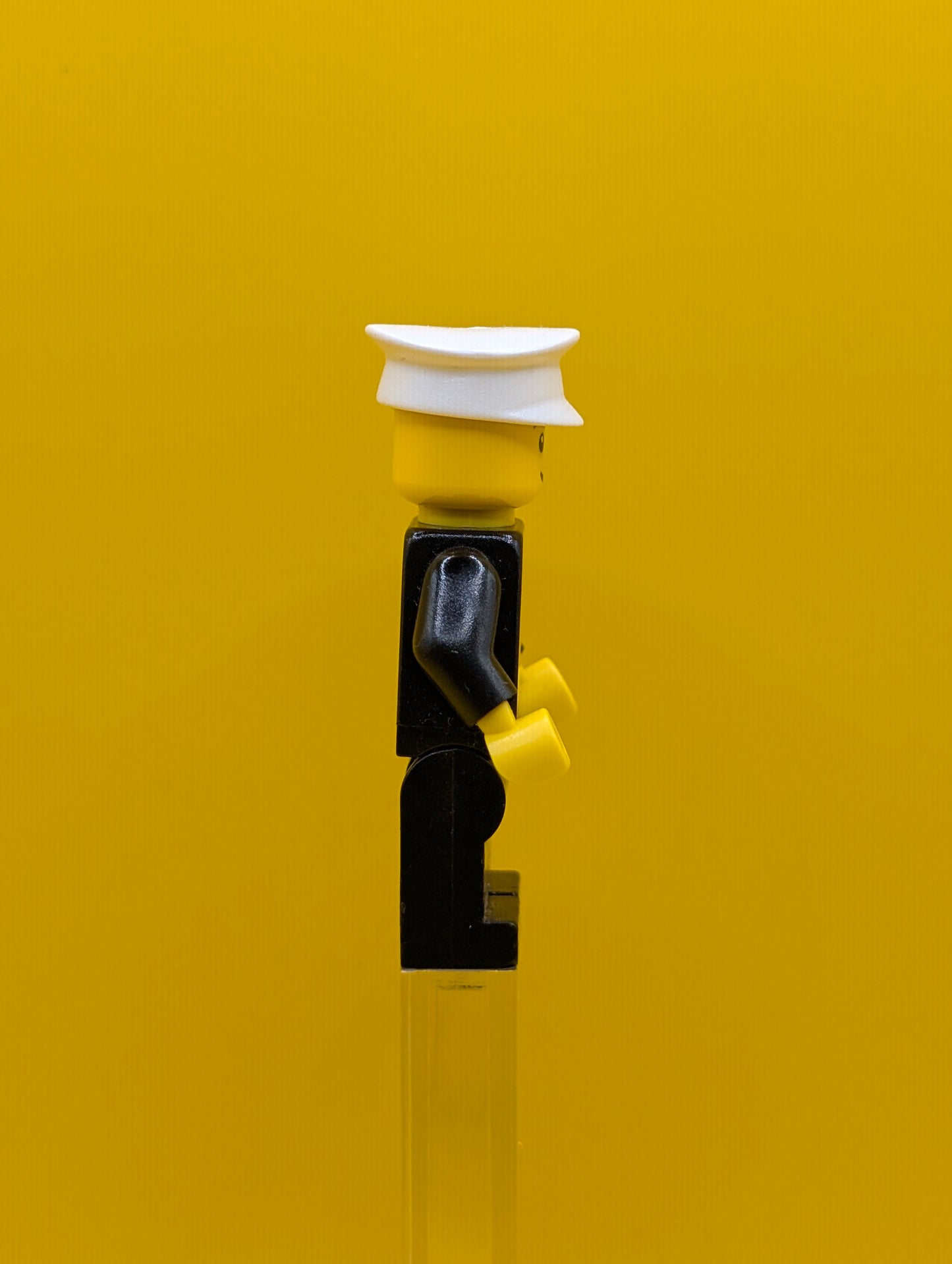 Police cty0005a City Suit with Blue Tie and Badge, Black Legs, White Hat, Black Eyebrows, Thin Grin Lego Minifigure