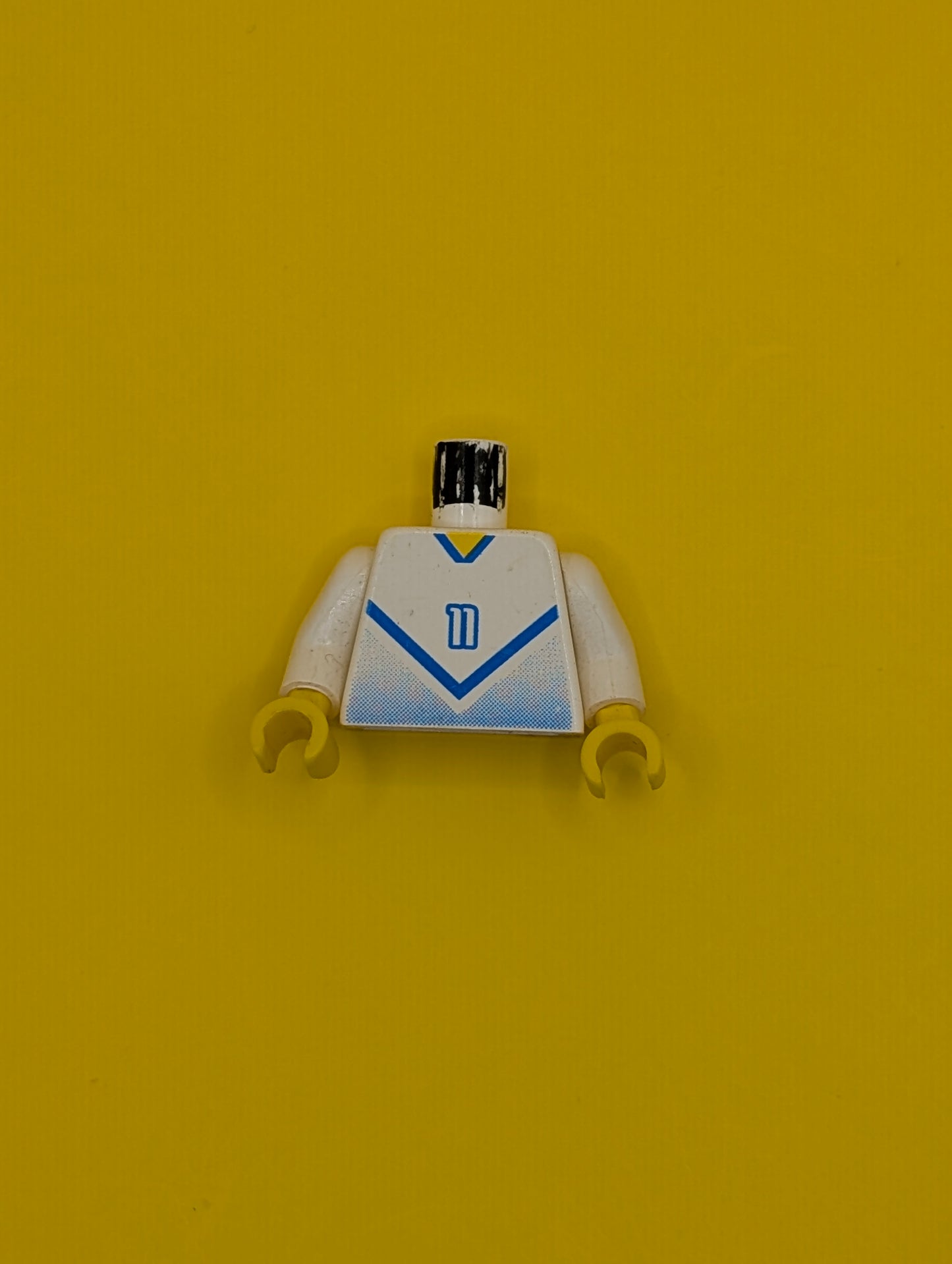 Torso Soccer Jersey Shirt with Blue Chevron and Number 11, Yellow Neck Pattern / White Arms / Yellow Hands 973pb0176c01 Lego
