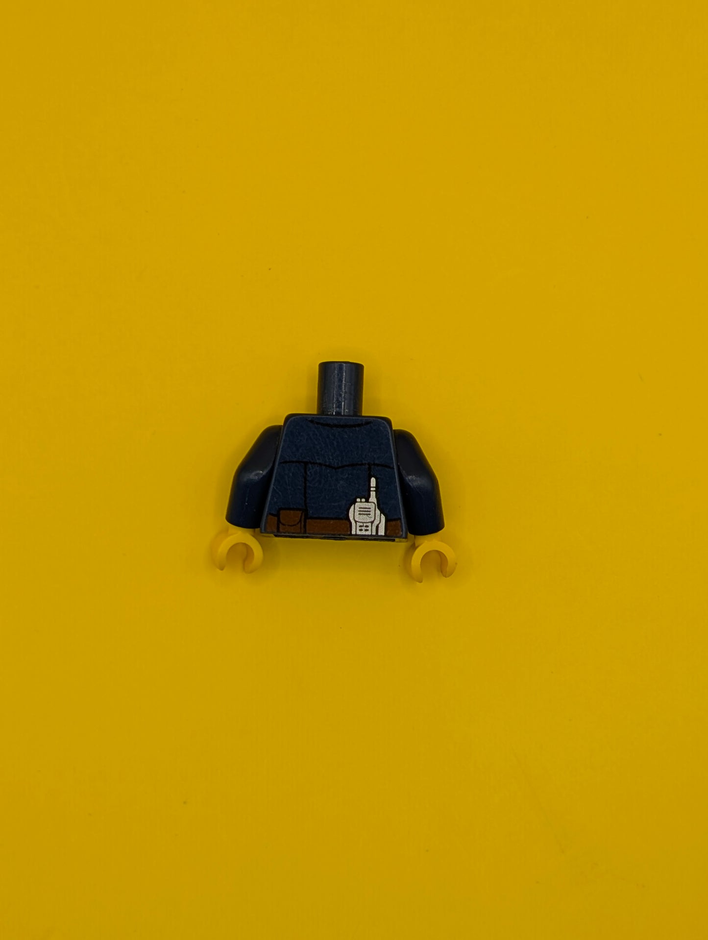 Torso Police Uniform with Gold Badge over White Shirt, Silver Radio, Reddish Brown Belt with Buckle and Pouches Pattern / Dark Blue Arms / Yellow Hands 973pb3011c01 Lego