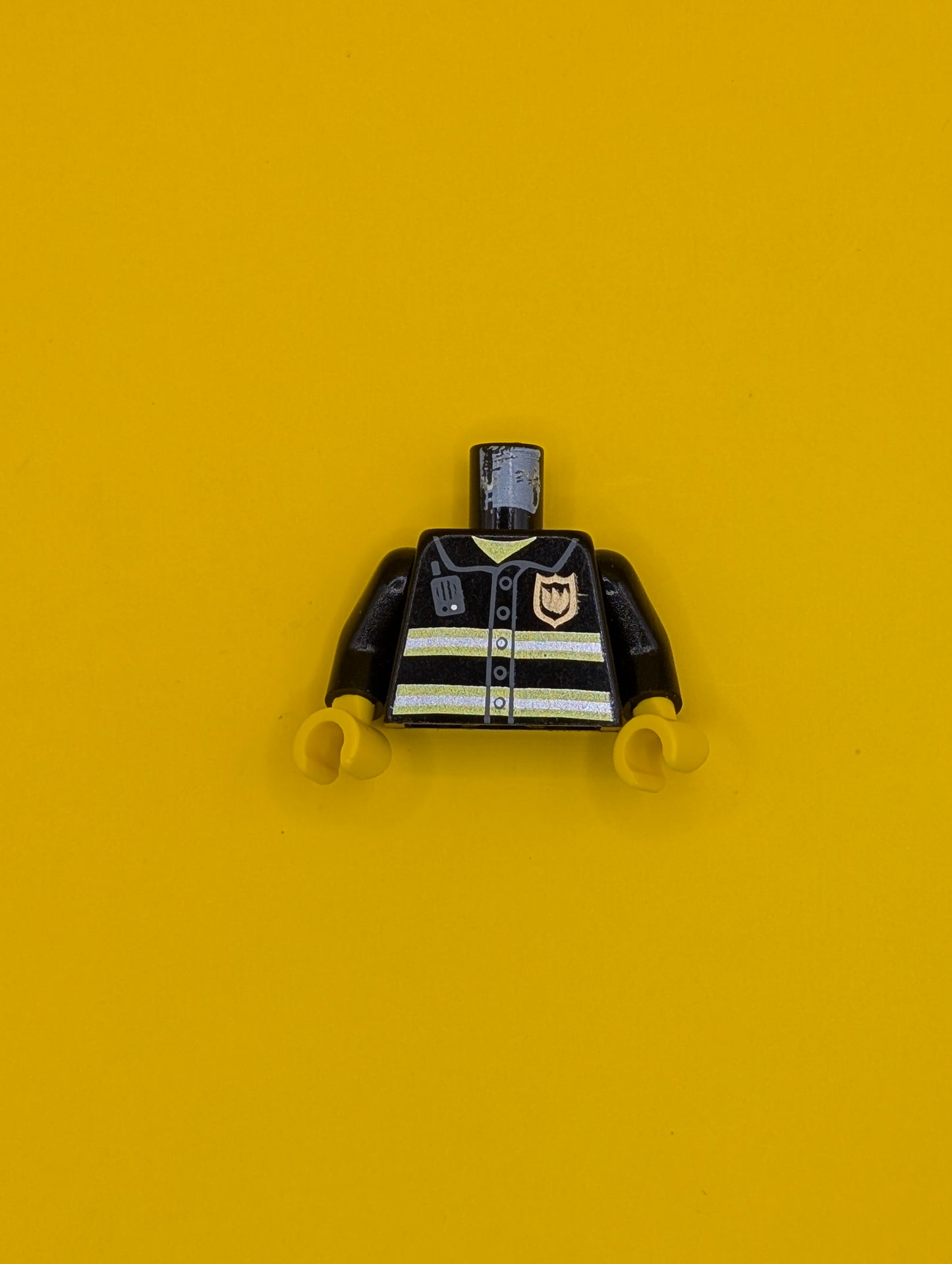 Torso Fire Uniform Gold Badge, Silver Reflective Stripes, Dark Bluish Gray Radio Pattern / Black Arms / Yellow Hands 973pb0300c01 Lego