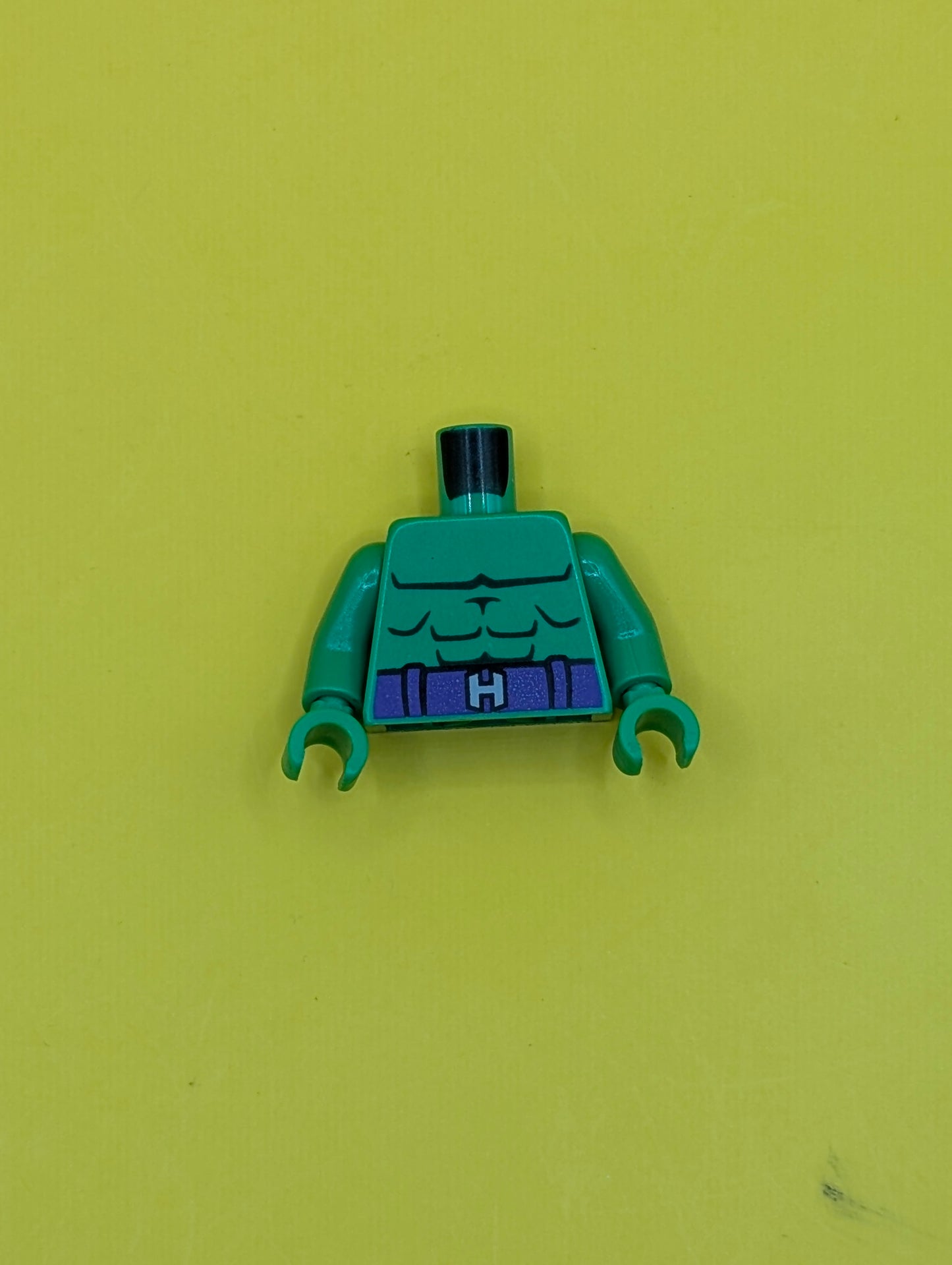 Torso Bare Chest with Dark Green Muscles Outline, Dark Purple Belt with Silver Capital Letter H Buckle Pattern / Bright Green Arms / Bright Green Hands 973pb2291c01 Lego