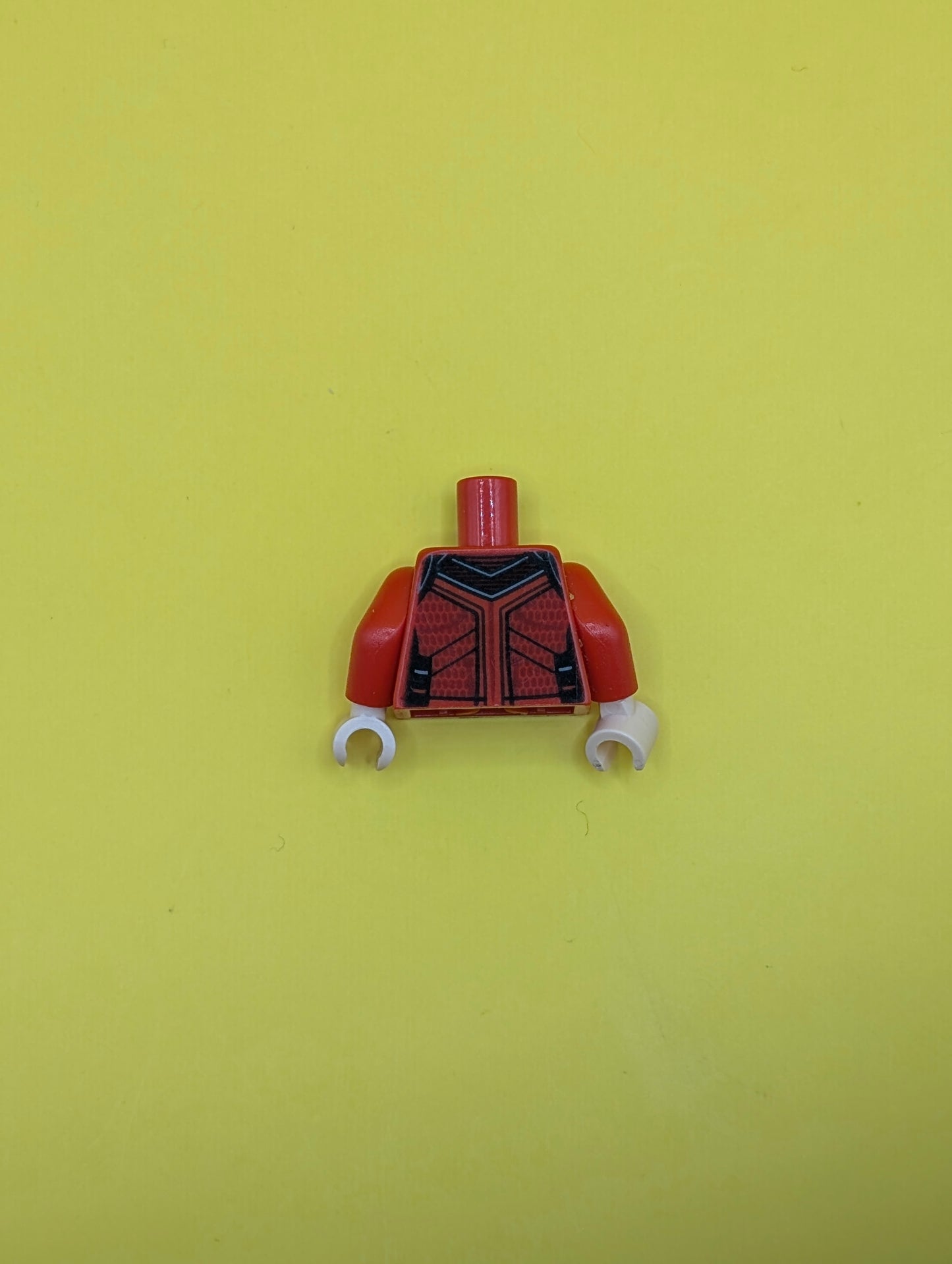 973pb4256c01 Torso Tang, Ornate with Black Ribbing, Dark Red Trim Pattern / Red Arms / Light Nougat Hands Lego Part