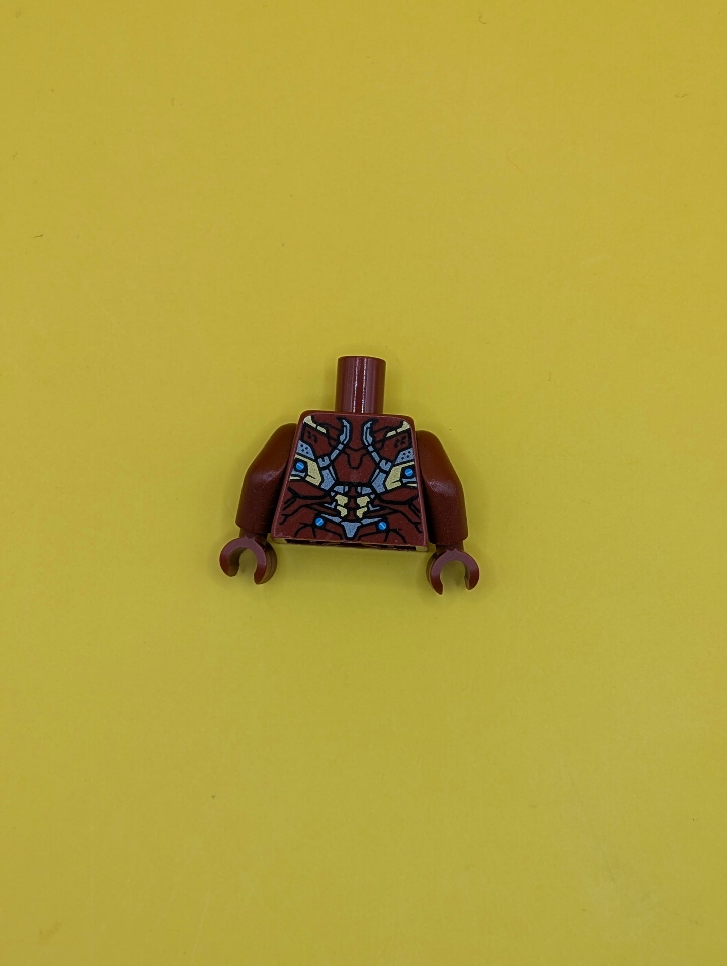 973pb2268c01 Torso Armor with Partial White and Blue Circle and Gold, Silver and Blue Plates (Mark 46) Pattern / Dark Red Arms / Dark Red Hands Lego Part