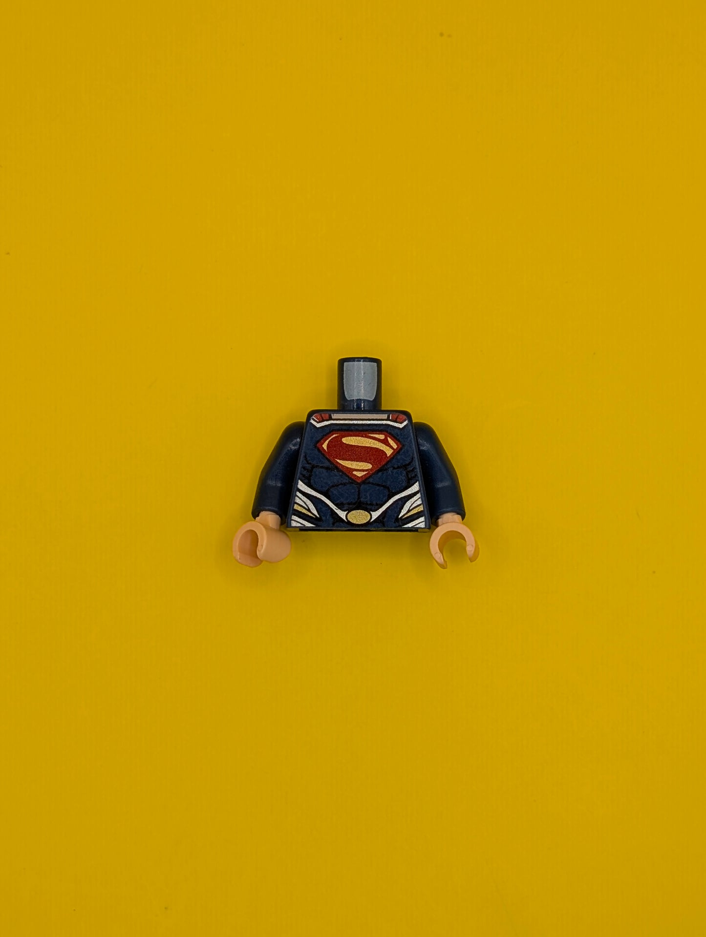 Torso Super Hero Costume with Black Muscles Outline, Red and Gold Superman 'S' Logo, Silver Trim, Oval Clasp Pattern / Dark Blue Arms / Light Nougat Hands 973pb1418c01 Lego
