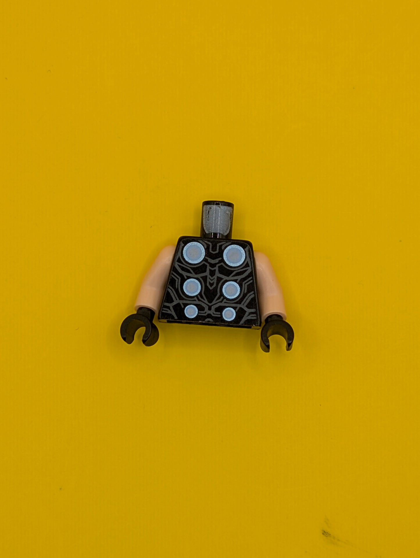 Torso Armor with 6 Metallic Light Blue, Bright Light Blue and White Circles, Dark Bluish Gray Contour Lines Pattern / Light Nougat Arms / Black Hands 973pb3058c01 Lego