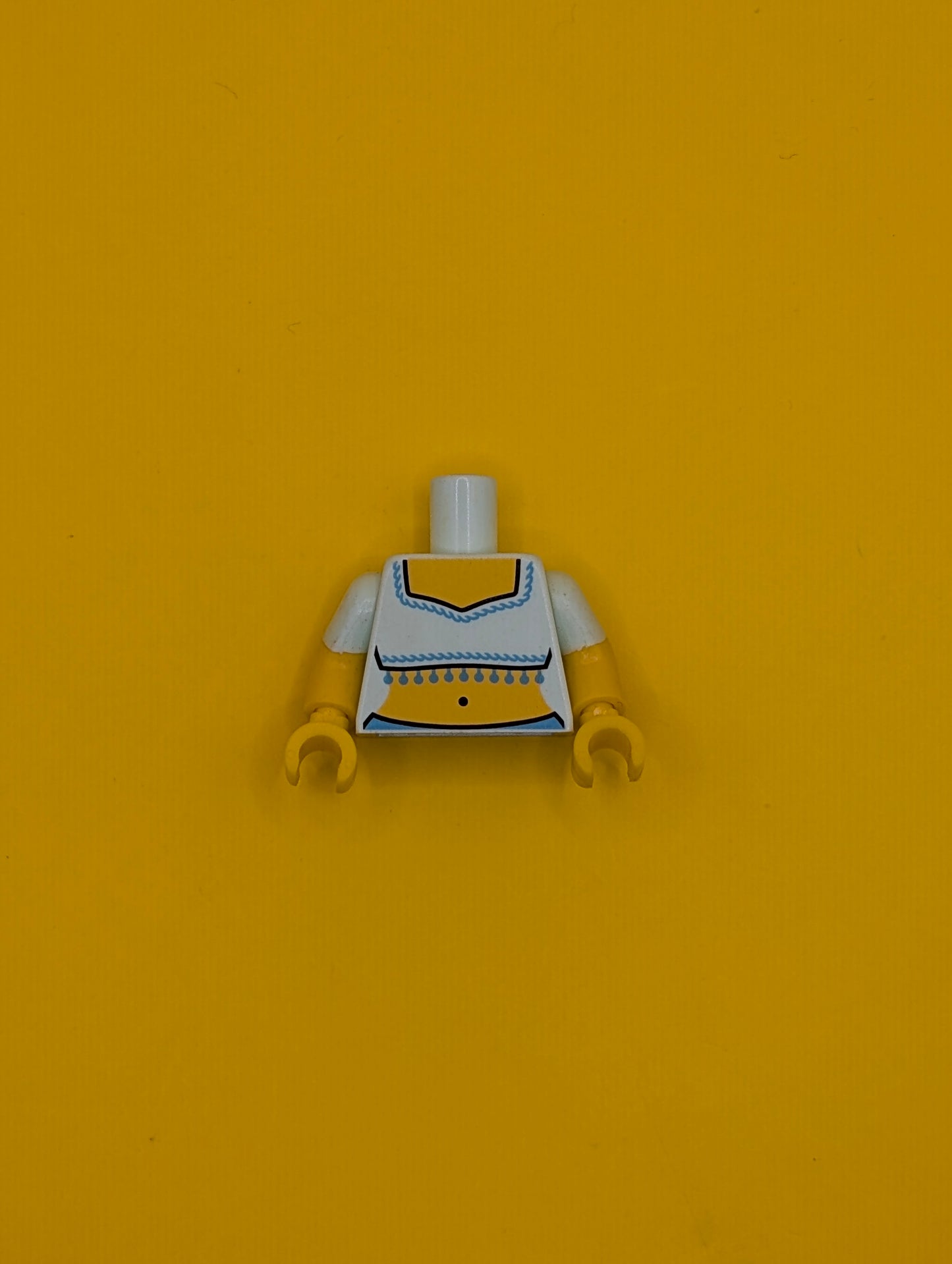 973pb1770c01 Torso Fringed Crop Top Pattern (Genie) / Yellow Arms with Molded Light Aqua Short Sleeves Pattern / Yellow Hands Lego Part
