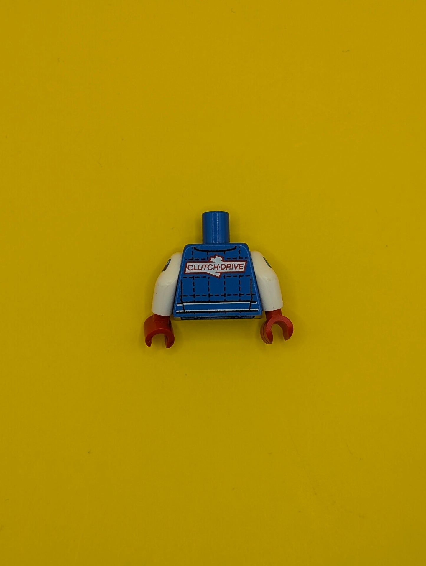 973pb3068c01 Torso Racing Jacket with 'RR' and 'CLUTCH DRIVE' Logos Pattern / White Arms with Red Stripe and 'GRAND BRIX' Pattern / Red Hands Lego Part