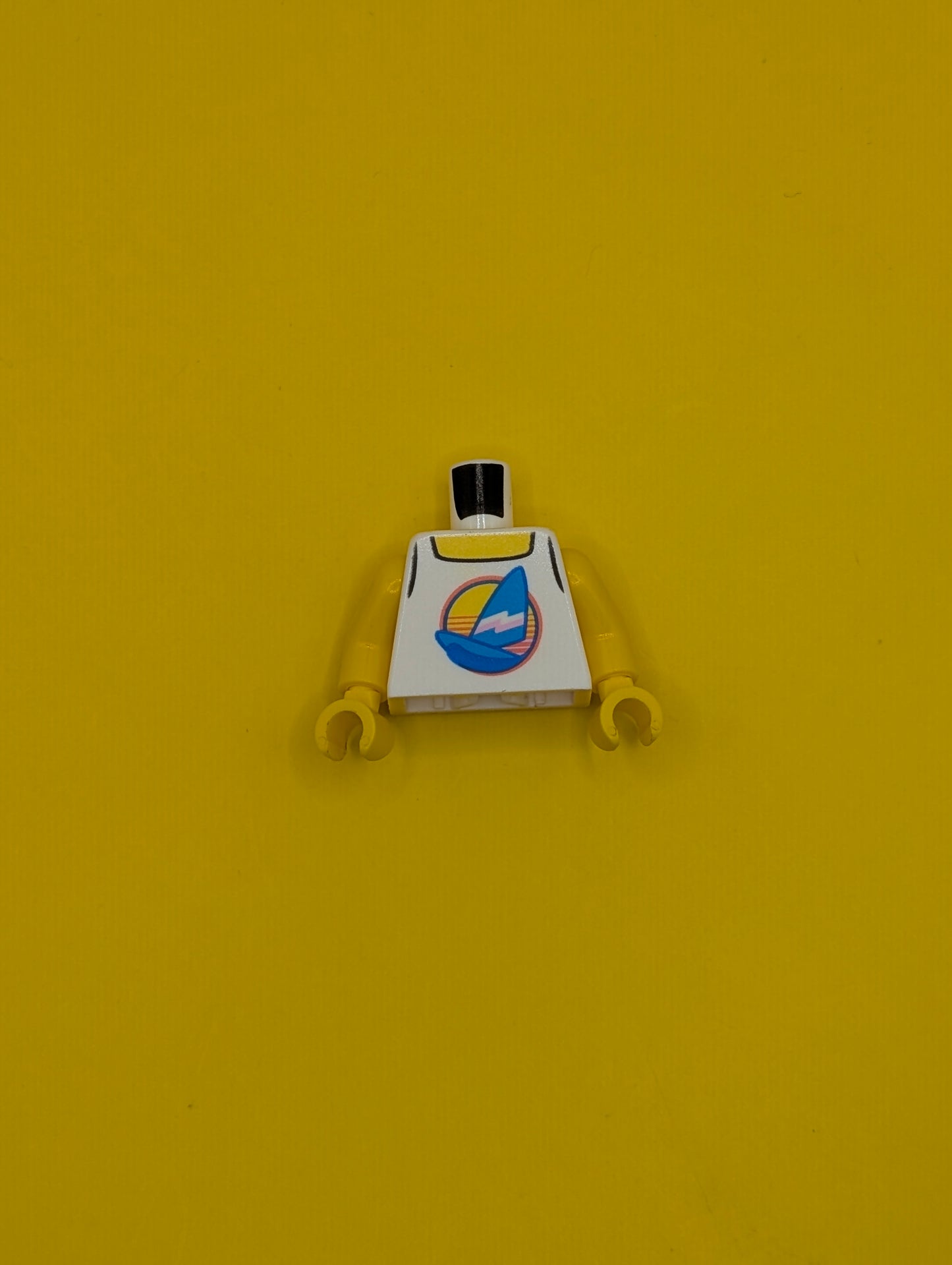 973pb3572c01 Torso Tank Top with Dark Azure Sailboat with Bright Pink and White Stripes in Circle, Yellow Neck Pattern / Yellow Arms / Yellow Hands Lego Part