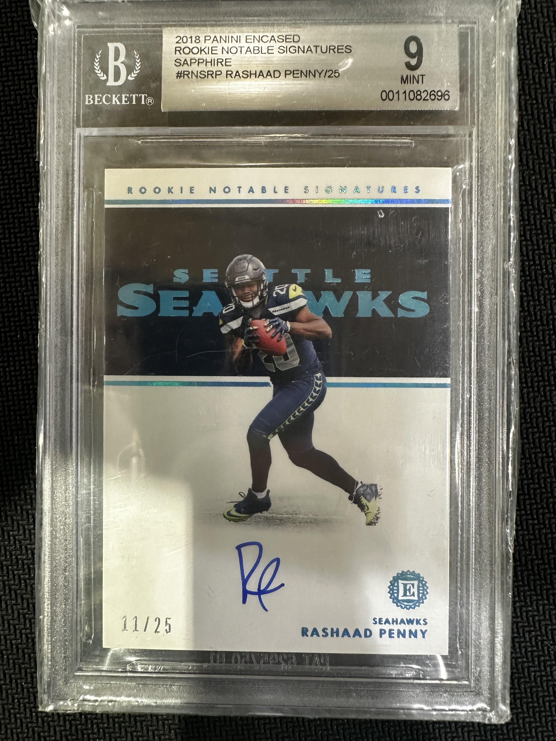 #110 Rashaad Penny 2018 Panini Encased Auto /25 9 Seattle Seahawks Sapphire