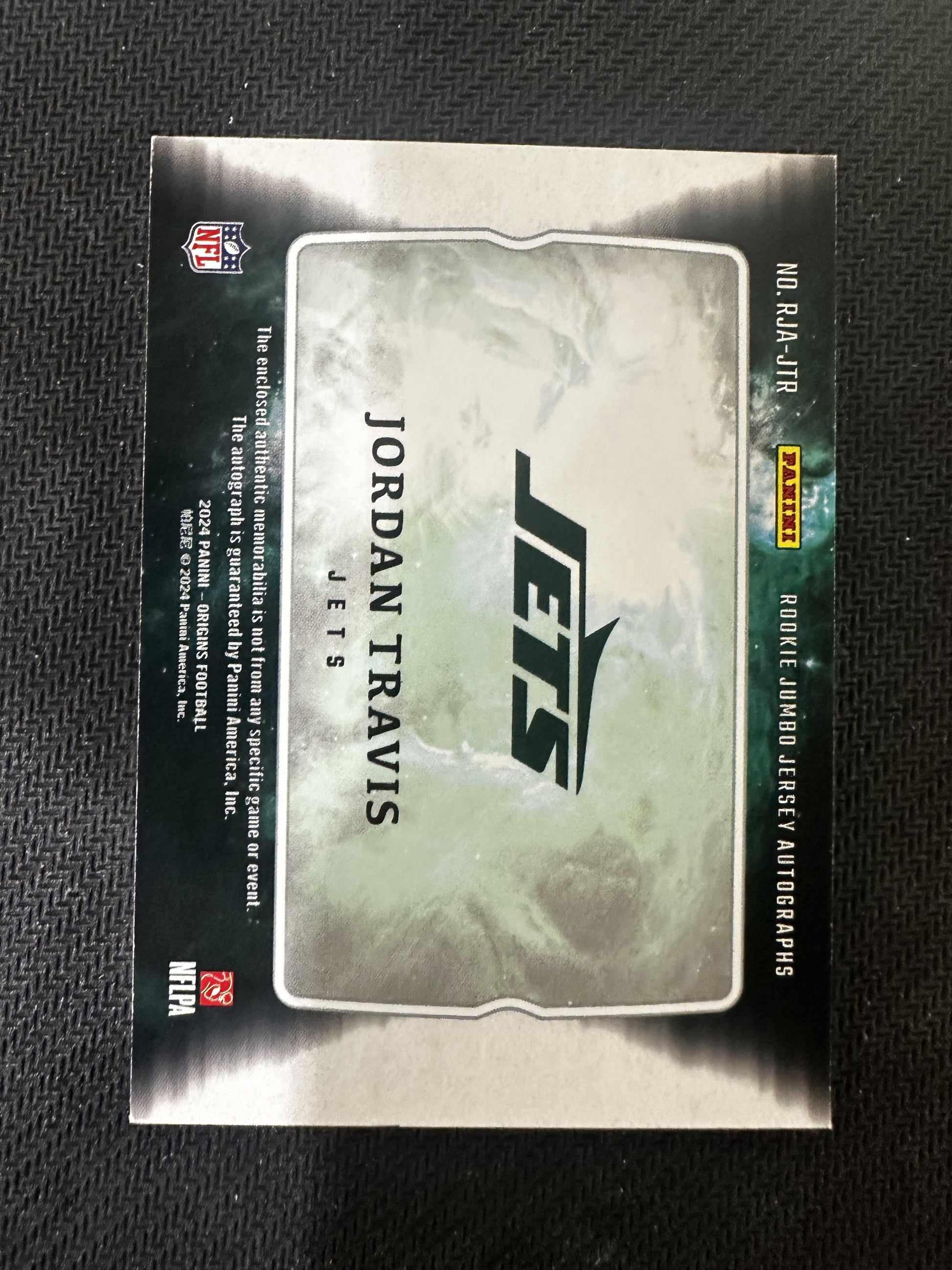 #RJA-JTR Jordan Travis 2024 Panini Origins /49 Jets Jumbo Jersey Auto Blue