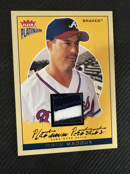 #PPP/GM Greg Maddux 2004 Fleer Platinum /100 Braves Portraits Game Patch