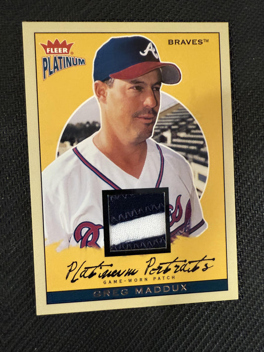 #PPP/GM Greg Maddux 2004 Fleer Platinum /100 Braves Portraits Game Patch