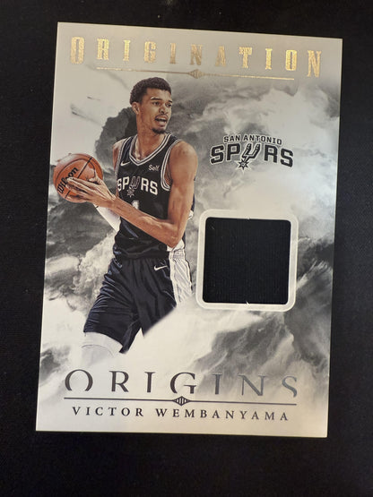 #OM-VWE Victor Wembanyama 2024-25 Panini Origins Spurs Origination Memorabilia