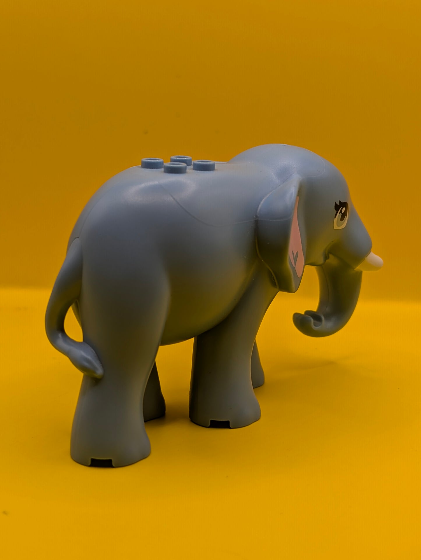 Elephant 67150c01pb01 Friends Style with Bright Light Blue Eyes with Eyelashes, Bright Pink Inner Ears and White Tusks Pattern Lego Minifigure