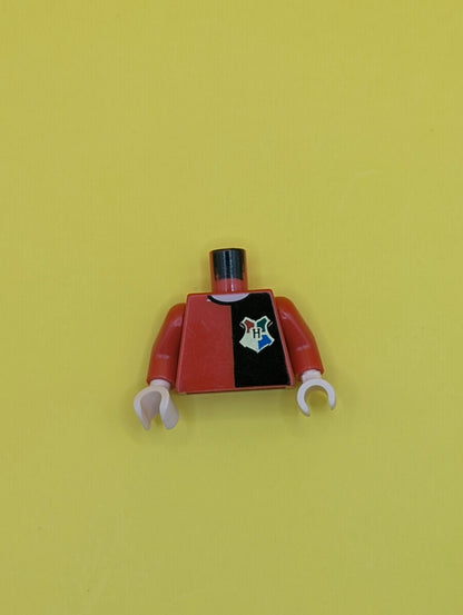 Torso Shirt with Black Left Half, Hogwarts Emblem, and Gold 'POTTER' and Star on Back, Light Nougat Neck Pattern / Red Arm Left / Black Arm Right / Light Nougat Hands 973pb0331c01 Lego
