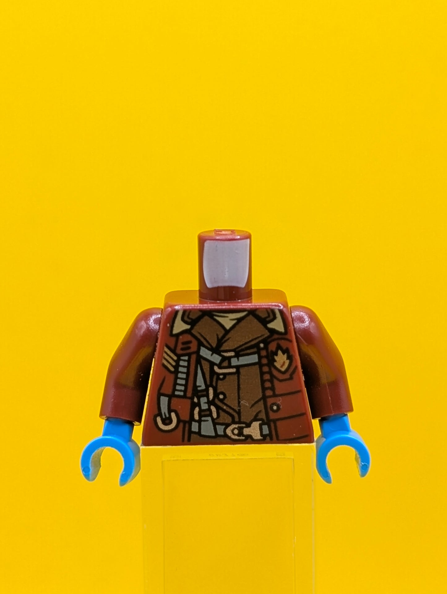 973pb2682c01 Torso Open Jacket with Badge over Reddish Brown Shirt and Harness Pattern / Dark Red Arms / Dark Azure Hands Lego