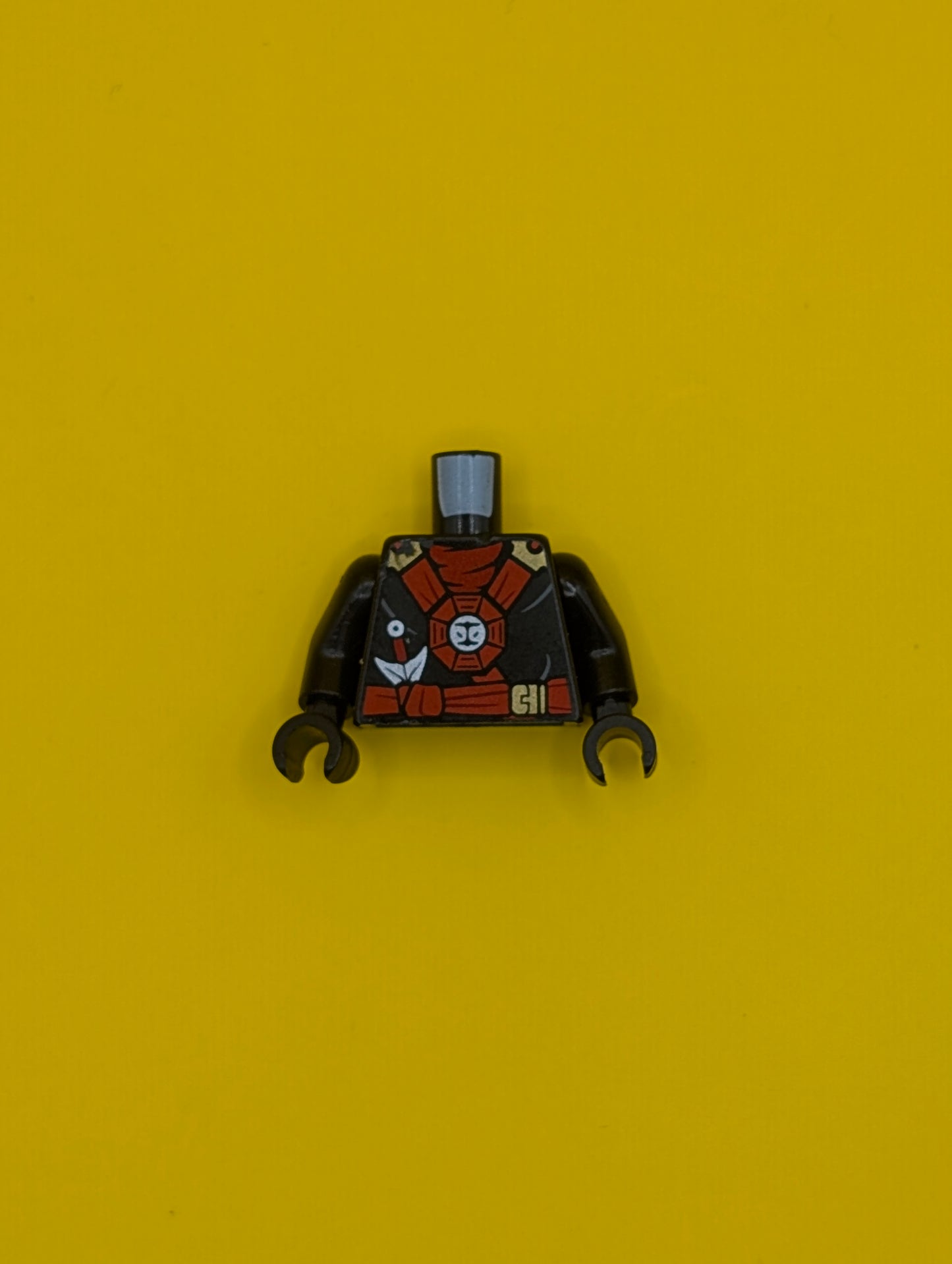 Torso Ninjago Red and Gold Straps and Belt, Round Emblem, Weapons and Dark Red Undershirt Pattern / Black Arms / Black Hands 973pb2077c01 Lego