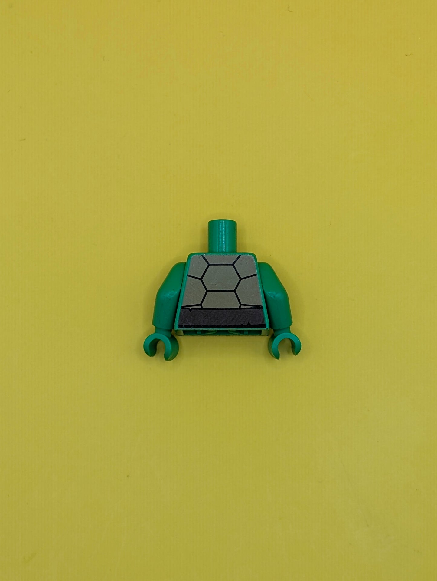 973pb1369c01 Torso Tan and Dark Tan Turtle Shell, Dark Brown Belt and Strap with Gold Ring Pattern / Bright Green Arms / Bright Green Hands Lego Part