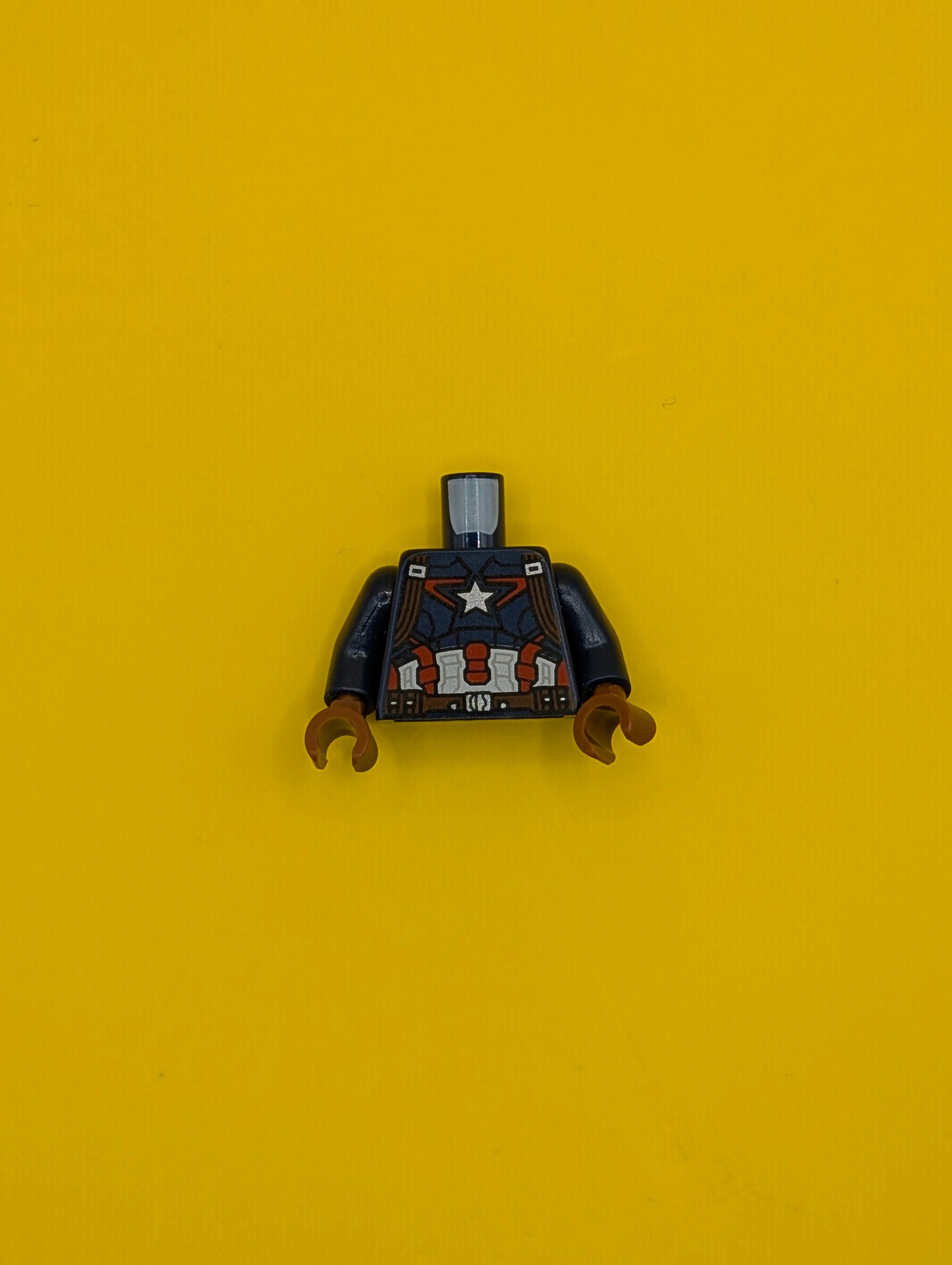973pb1956c01 Torso Armor with Silver Star on Chest and Red, White and Reddish Brown Harness Pattern / Dark Blue Arms / Reddish Brown Hands Lego Part