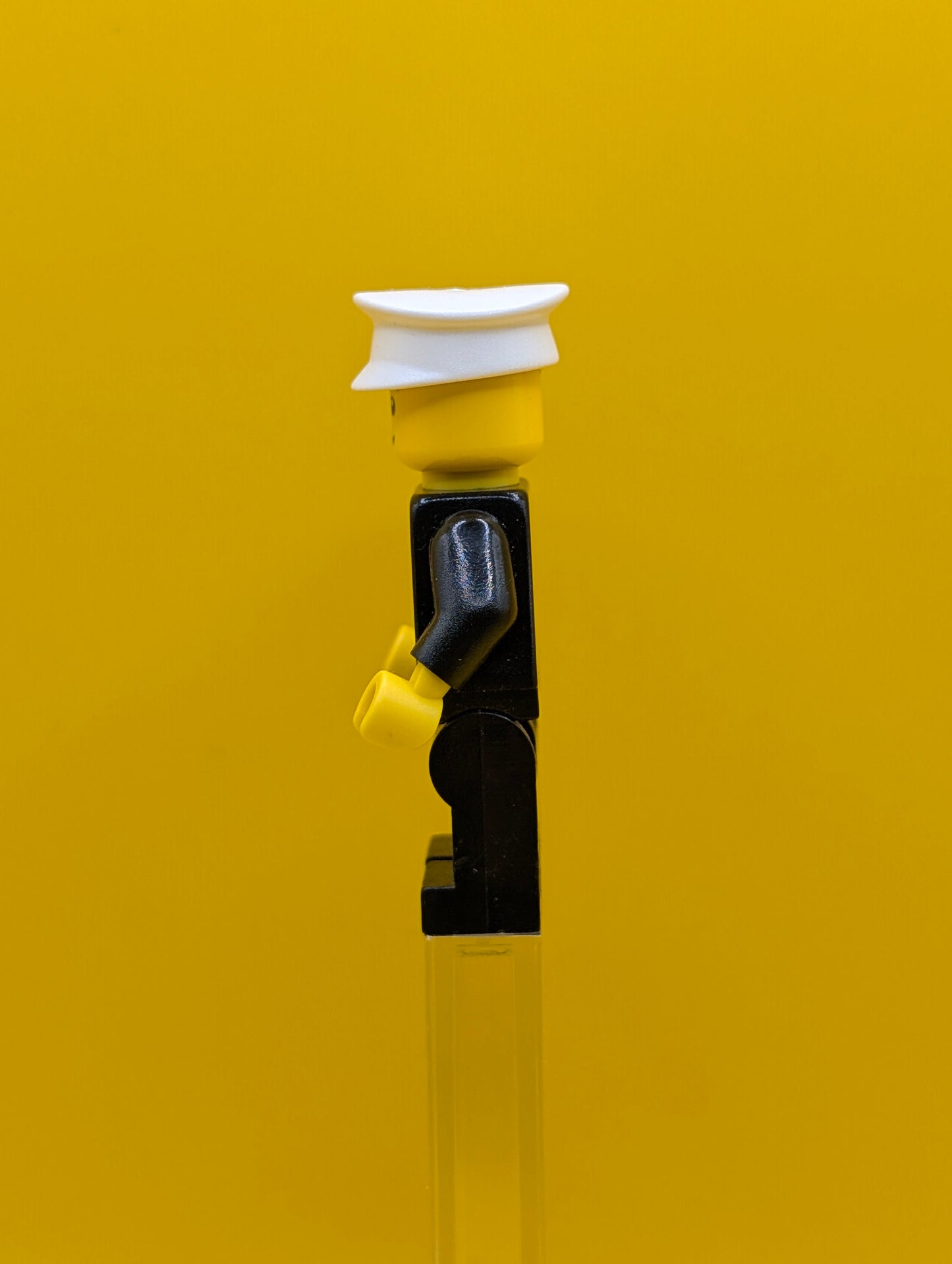 Police cty0005a City Suit with Blue Tie and Badge, Black Legs, White Hat, Black Eyebrows, Thin Grin Lego Minifigure