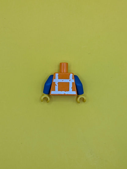 973pb3370c01 Torso Safety Vest with Reflective Worn Crossed Stripes over Blue Shirt Pattern / Blue Arms / Yellow Hands Lego Part