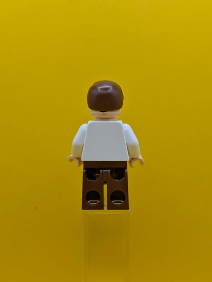Han Solo sw0403 White Shirt with Wrinkles on Front, Reddish Brown Legs, Dual Sided Head Star Wars Lego Minifigure
