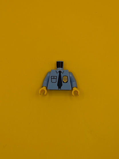 973pb0801c01 Torso Police Uniform Shirt with Pocket and White 'POLICE' on Back, Gold Badge, Dark Blue Tie Pattern / Medium Blue Arms / Yellow Hands Lego Part