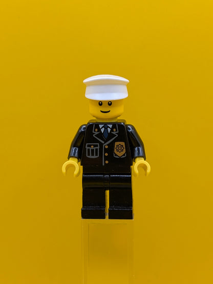 Police cty0005a City Suit with Blue Tie and Badge, Black Legs, White Hat, Black Eyebrows, Thin Grin Lego Minifigure