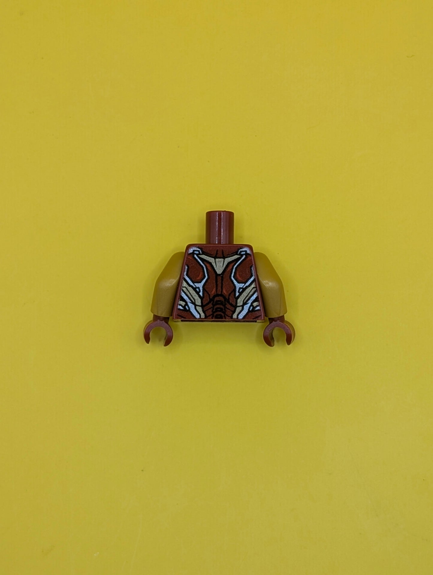 973pb3503c01 Torso Armor with Thin Red Markings, Bright Light Blue Triangular Arc Reactor, Silver and Gold Trim Pattern / Pearl Gold Arms / Dark Red Hands Lego Part