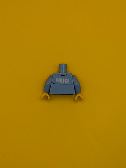 973pb0801c01 Torso Police Uniform Shirt with Pocket and White 'POLICE' on Back, Gold Badge, Dark Blue Tie Pattern / Medium Blue Arms / Yellow Hands Lego Part