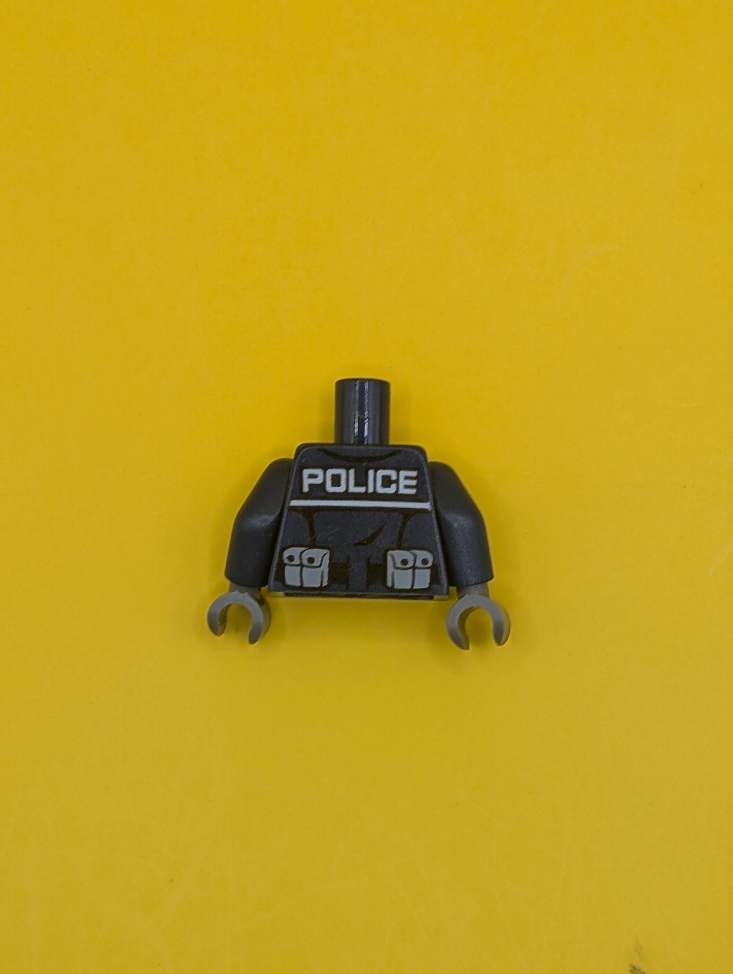 Torso Police Jacket with White Undershirt, Zippers, Gold Badge and Buckle with 'POLICE' Pattern on Back / Dark Blue Arms / Dark Bluish Gray Hands 973pb1547c01 Lego