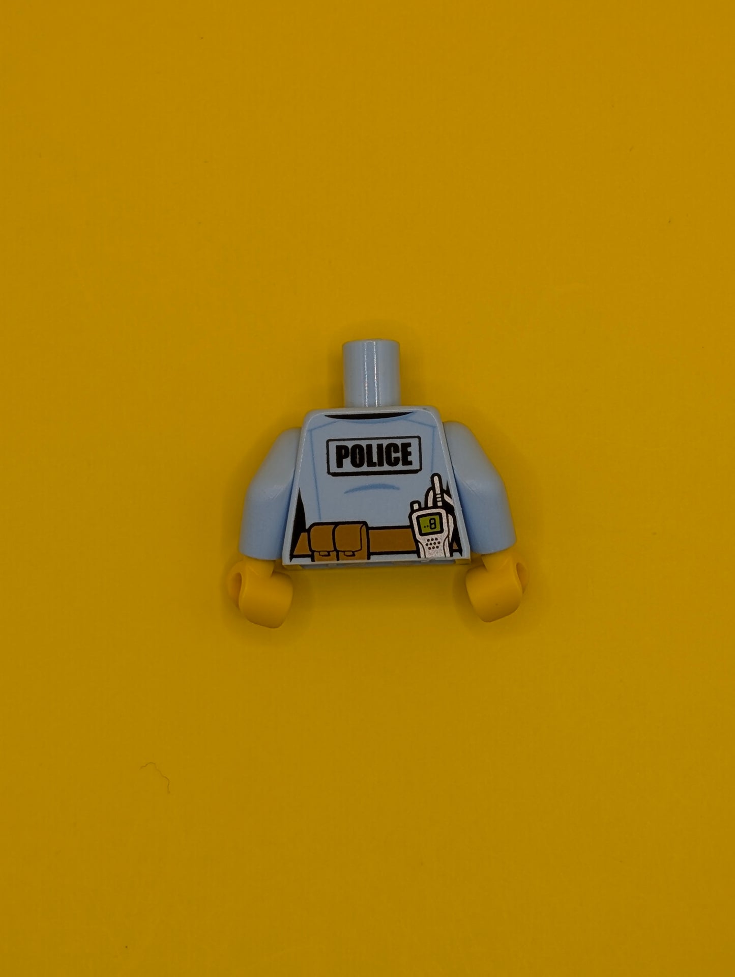 Torso Police Female Shirt with Gold Badge, Dark Tan Belt with Pocket and 'POLICE' and Radio on Back Pattern / Bright Light Blue Arms / Yellow Hands 973pb2663c01 Lego