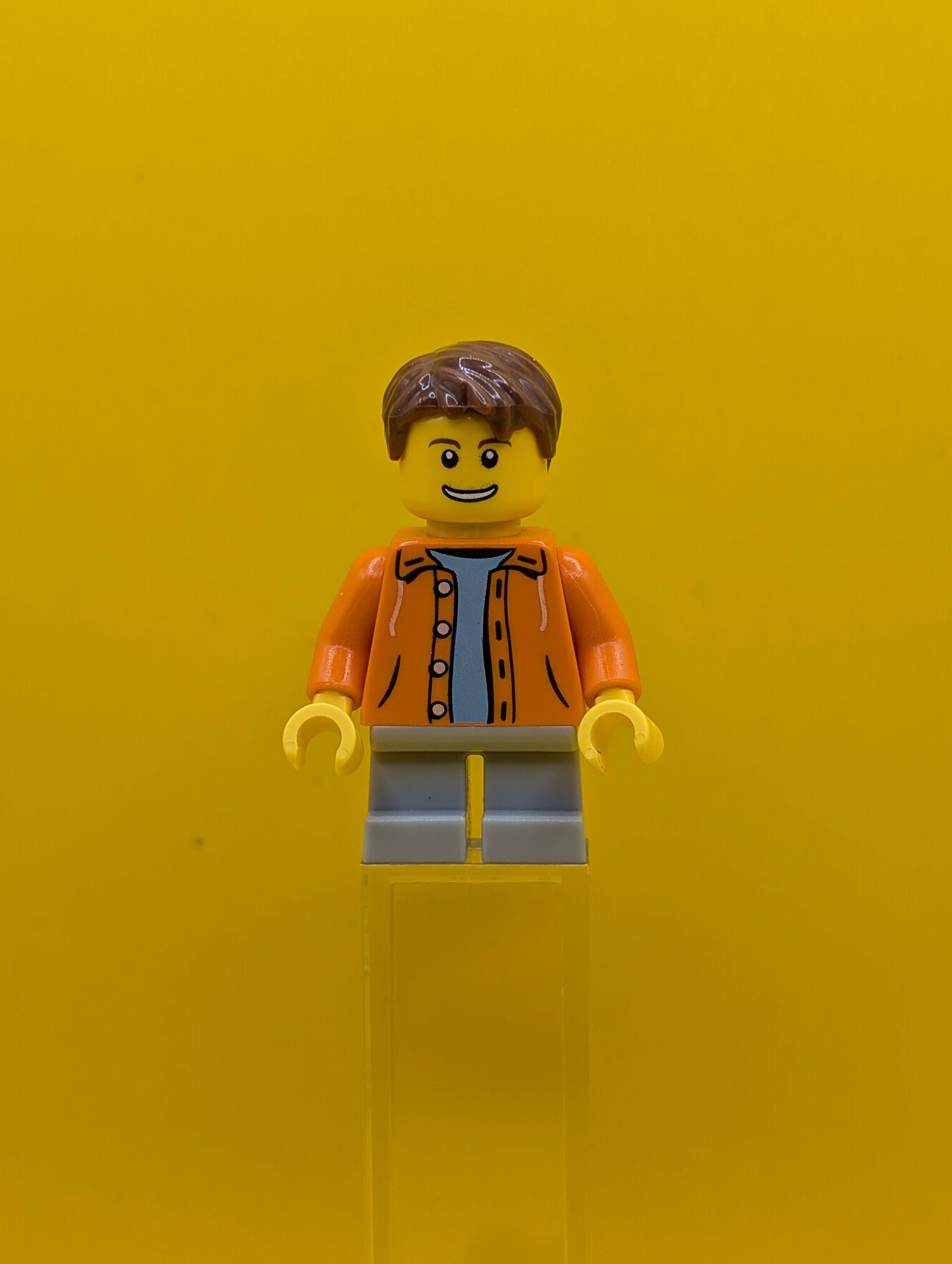 Orange Jacket cty0440 with Hood over Light Blue Sweater, Light Bluish Gray Short Legs, Reddish Brown Short Tousled Hair City Lego Minifigure