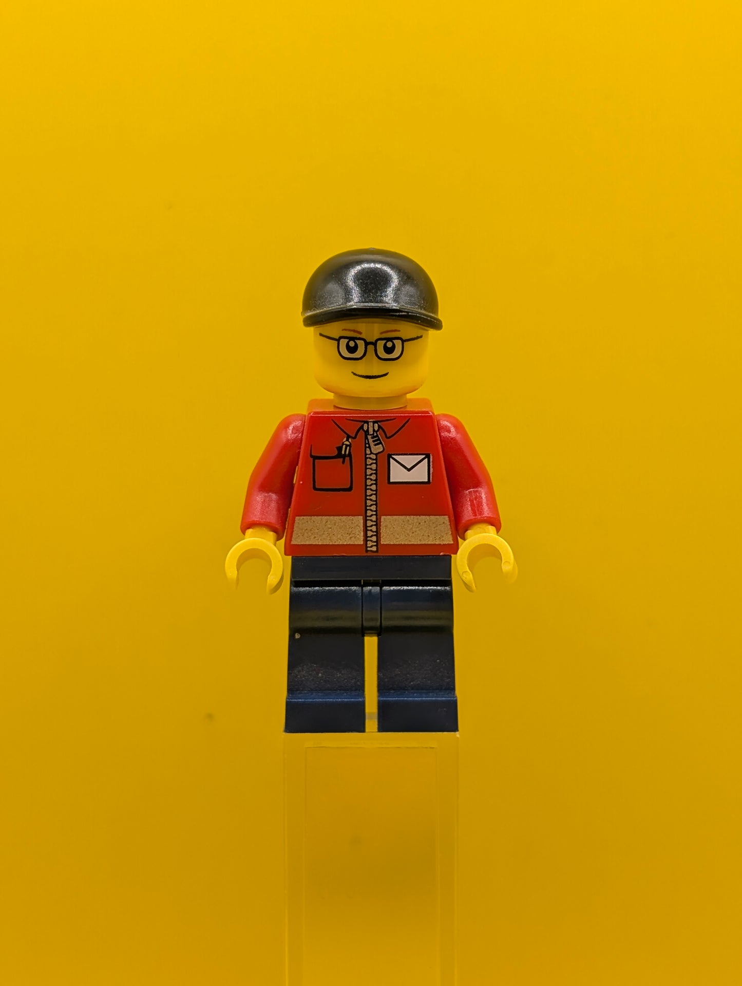 Post Office twn145 White Envelope and Stripe, Dark Blue Legs, Black Short Bill Cap City Lego Minifigure