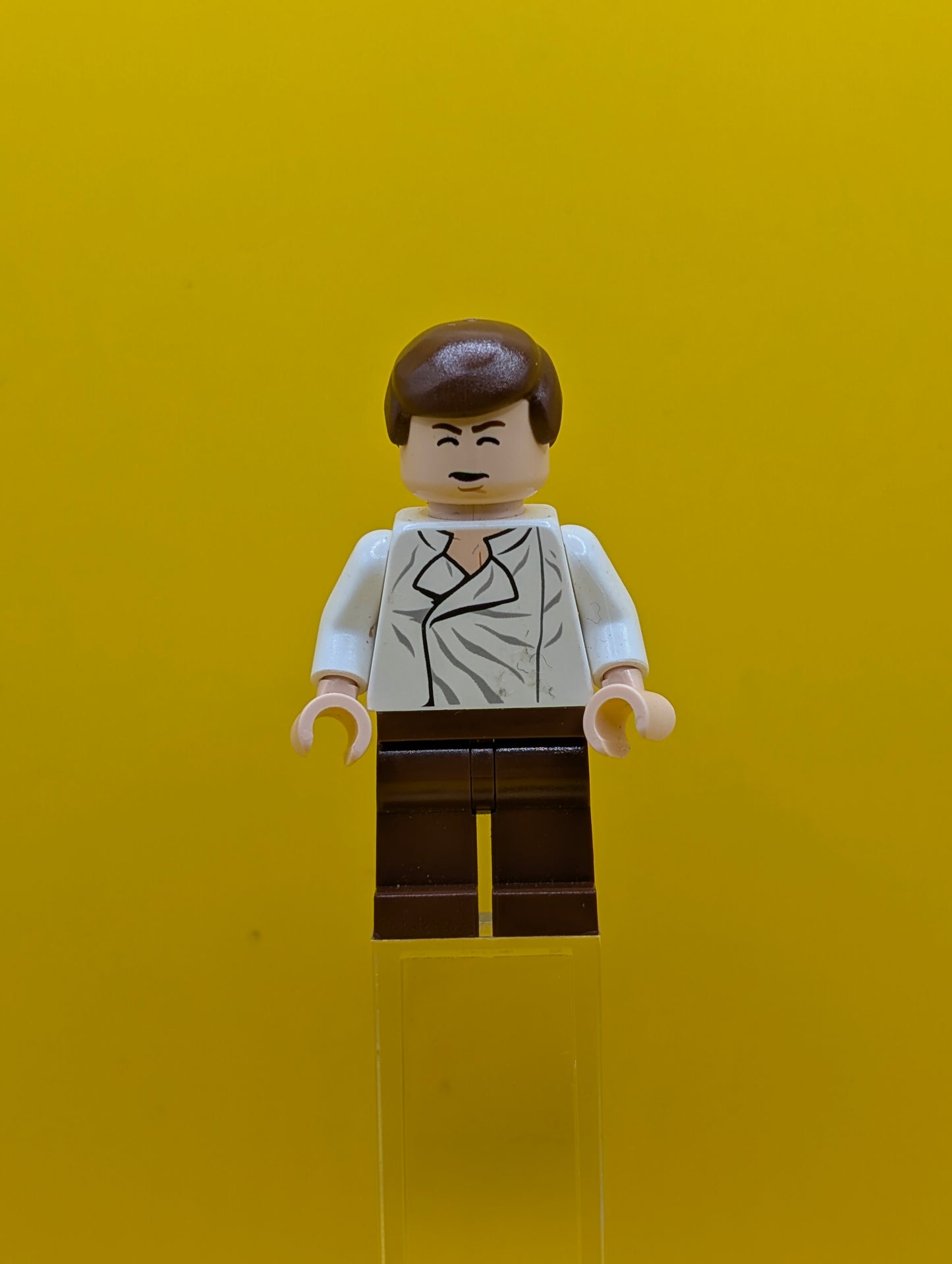 Han Solo sw0403 White Shirt with Wrinkles on Front, Reddish Brown Legs, Dual Sided Head Star Wars Lego Minifigure